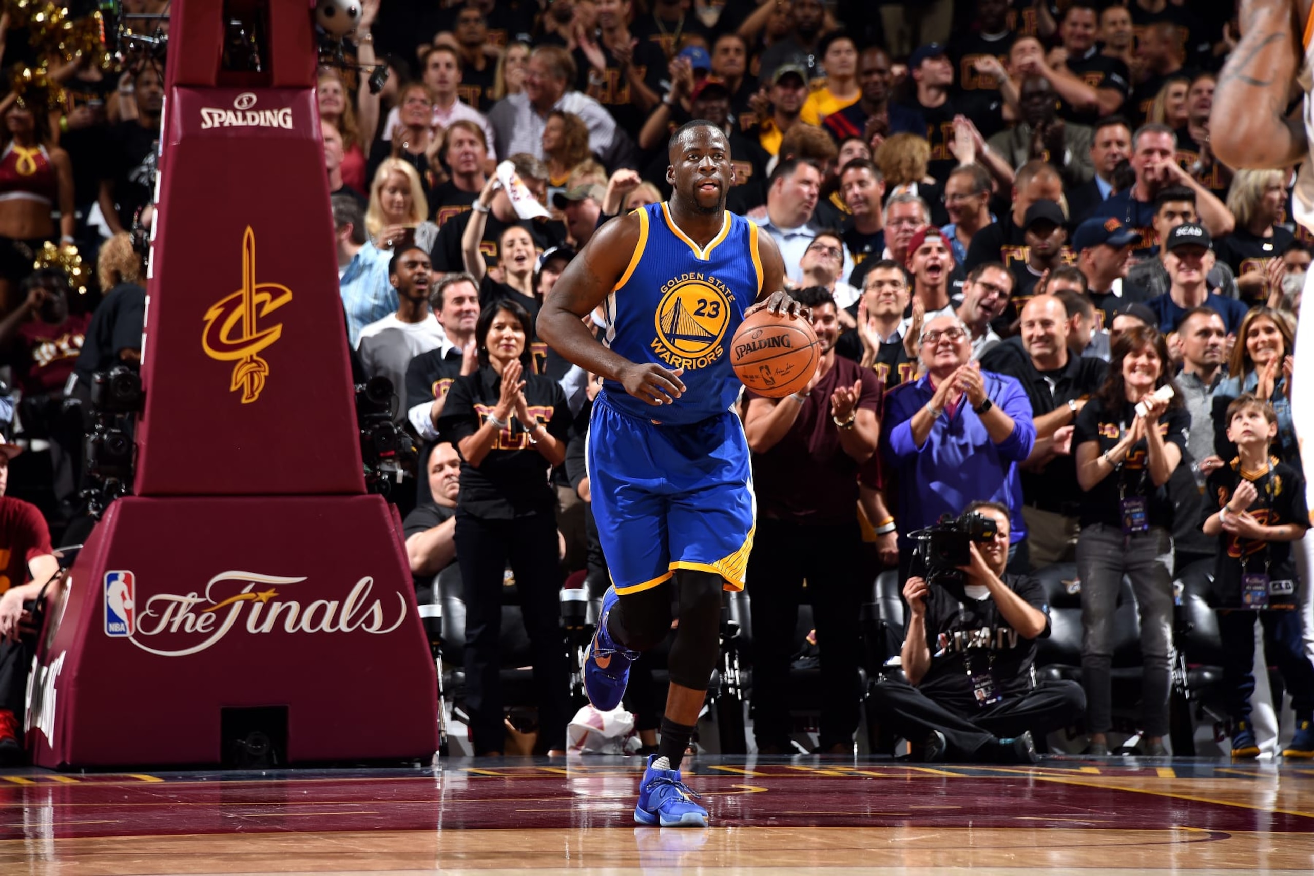 CLEVELAND, OH - JUNE 16: Draymond Green #23 of the Golden State Warriors handles the ball during the game against the Cleveland Cavaliers during Game Six of the 2016 NBA Finals on June 16, 2016 at Quicken Loans Arena in Cleveland, Ohio. NOTE TO USER: User expressly acknowledges and agrees that, by downloading and/or using this Photograph, user is consenting to the terms and conditions of the Getty Images License Agreement. Mandatory Copyright Notice: Copyright 2016 NBAE (Photo by Andrew D. Bernstein/NBAE via Getty Images)