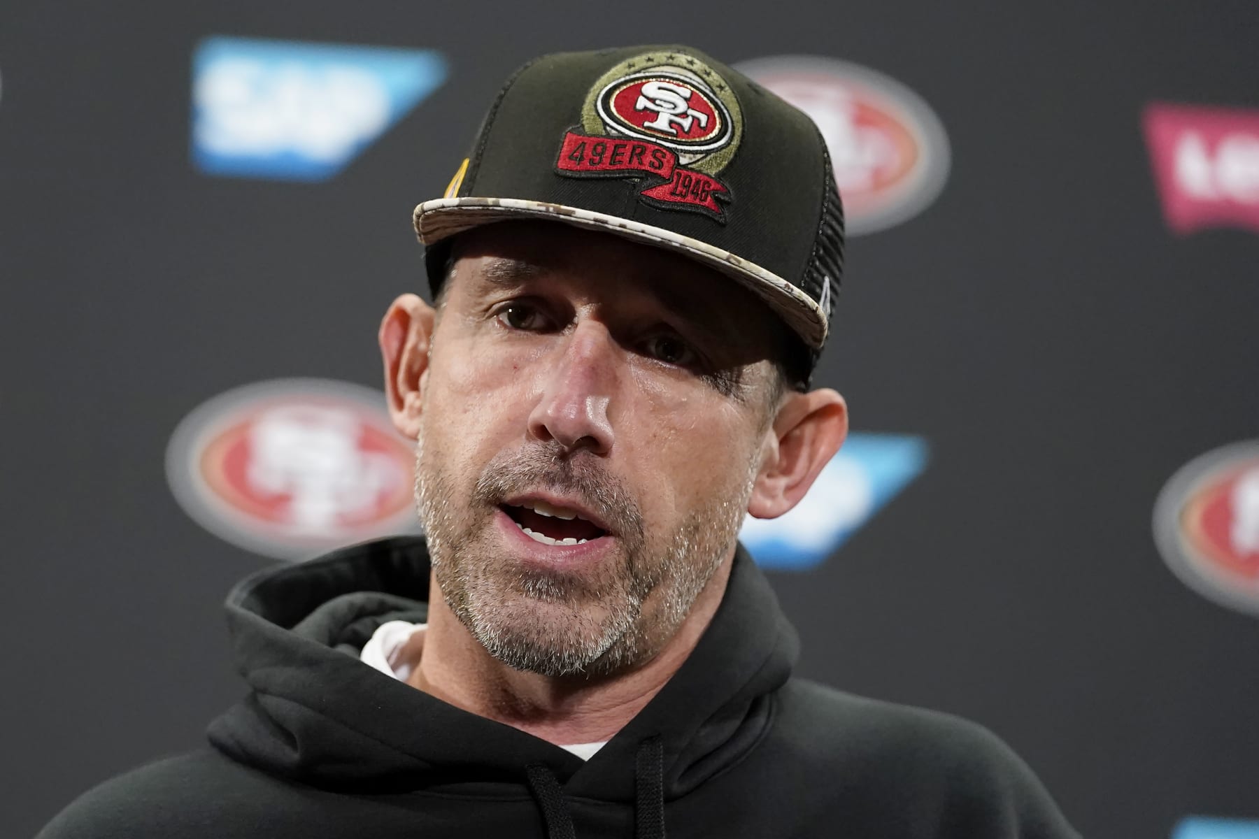 San Francisco 49ers head coach Kyle Shanahan speaks at a news conference after an NFL wild card playoff football game against the Seattle Seahawks in Santa Clara, Calif., Saturday, Jan. 14, 2023. (AP Photo/Godofredo A. Vásquez)