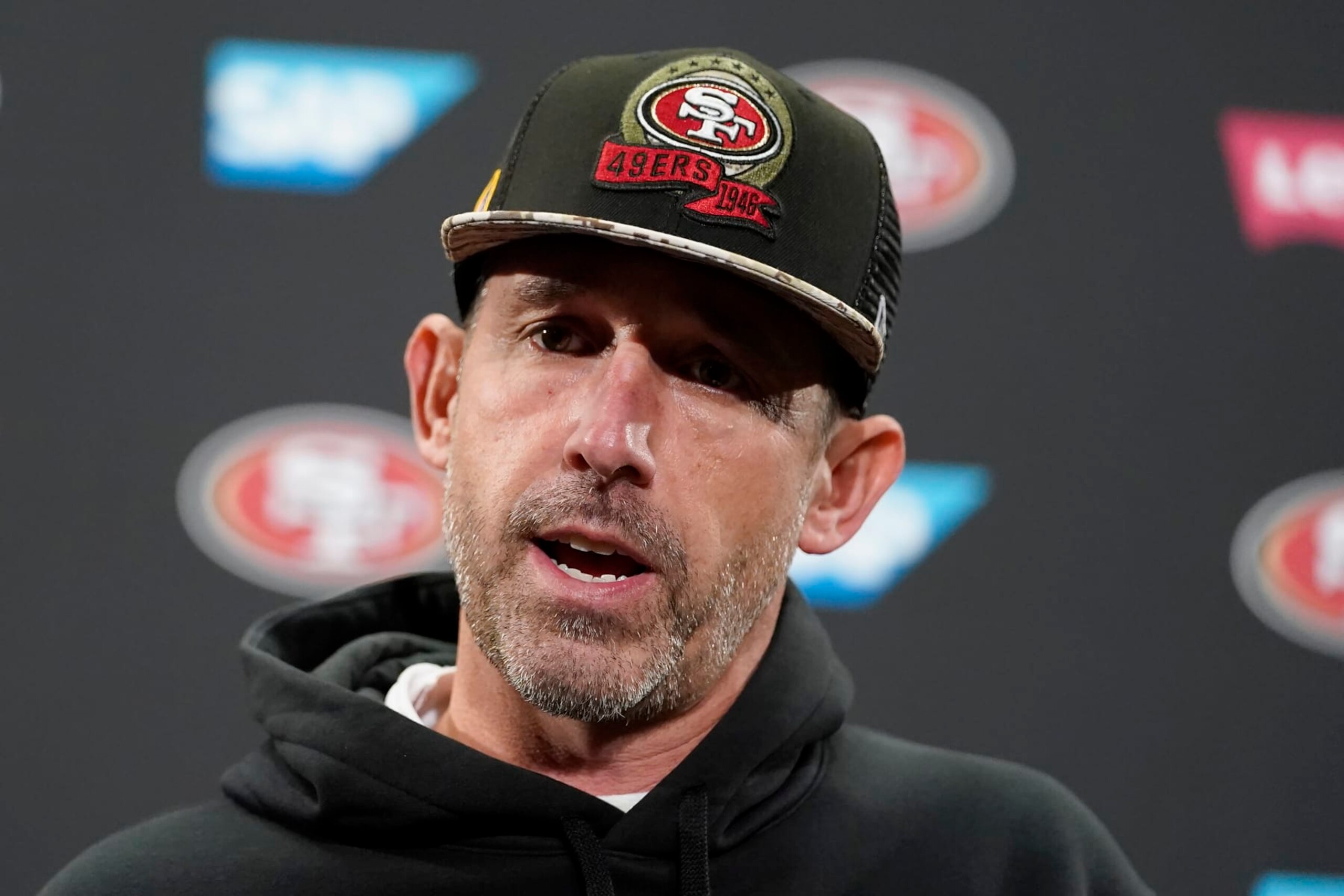 San Francisco 49ers head coach Kyle Shanahan speaks at a news conference after an NFL wild card playoff football game against the Seattle Seahawks in Santa Clara, Calif., Saturday, Jan. 14, 2023. (AP Photo/Godofredo A. Vásquez)