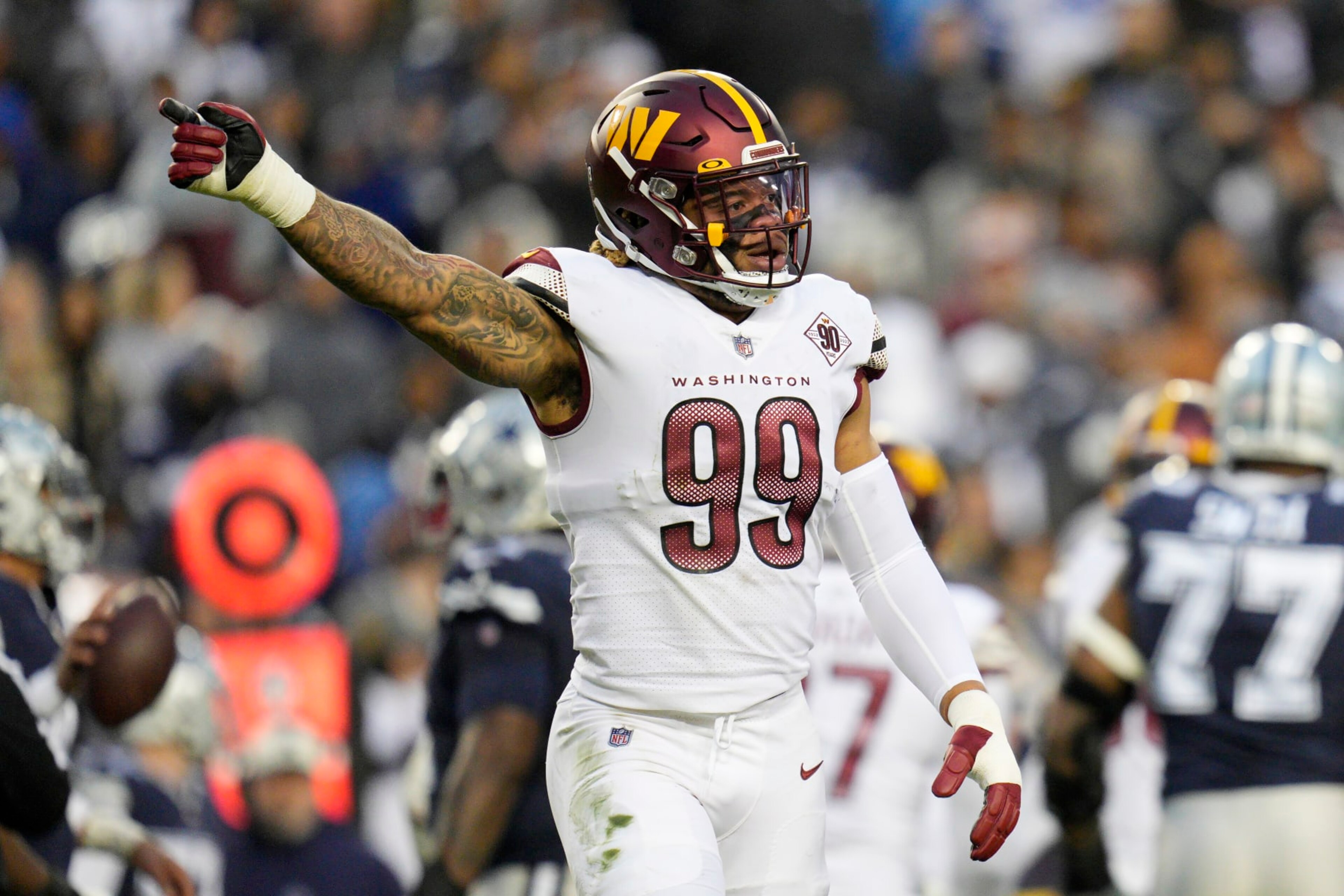 LANDOVER, MARYLAND - JANUARY 08: Chase Young #99 of the Washington Commanders looks on during the first half of the game against the Dallas Cowboys at FedExField on January 08, 2023 in Landover, Maryland. (Photo by Jess Rapfogel/Getty Images) LANDOVER, MARYLAND - JANUARY 08: Chase Young #99 of the Washington Commanders looks on during the first half of the game against the Dallas Cowboys at FedExField on January 08, 2023 in Landover, Maryland. (Photo by Jess Rapfogel/Getty Images)