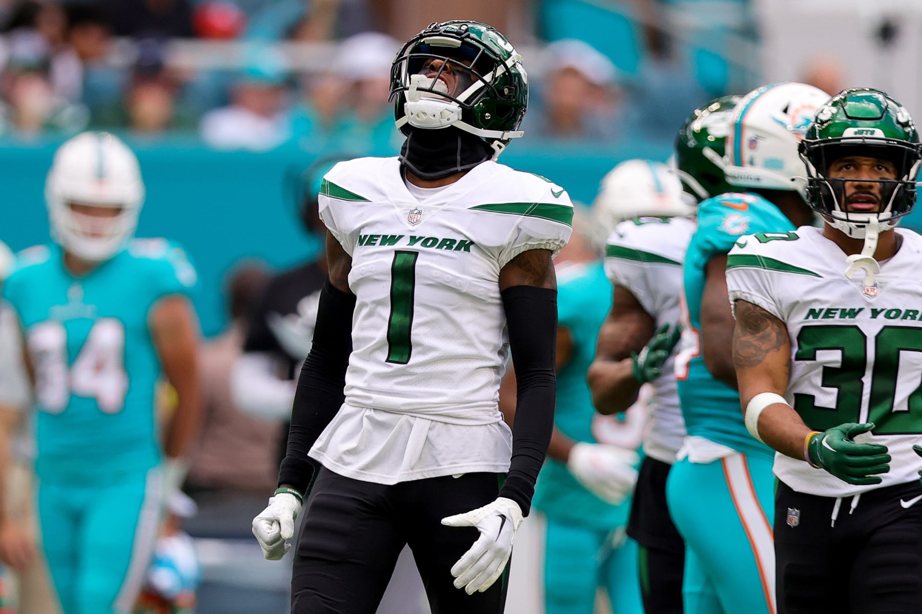 MIAMI GARDENS, FLORIDA - JANUARY 08: Sauce Gardner #1 of the New York Jets reacts after a play against the Miami Dolphins during the second quarter at Hard Rock Stadium on January 08, 2023 in Miami Gardens, Florida. (Photo by Megan Briggs/Getty Images)