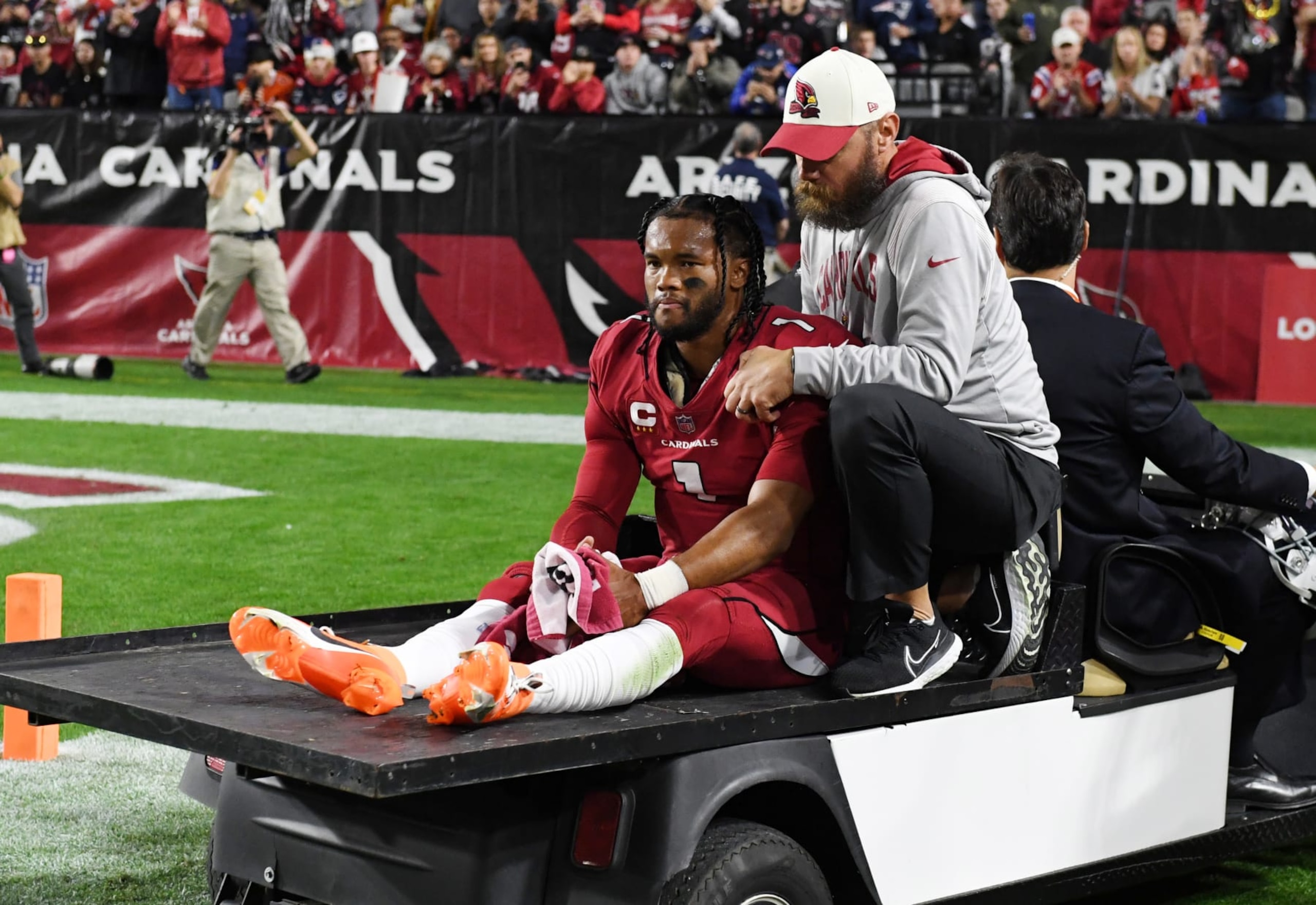 GLENDALE, ARIZONA - DECEMBER 12: Kyler Murray #1 of the Arizona Cardinals is carted off the field after an injury during a game against the New England Patriots at State Farm Stadium on December 12, 2022 in Glendale, Arizona. (Photo by Norm Hall/Getty Images) GLENDALE, ARIZONA - DECEMBER 12: Kyler Murray #1 of the Arizona Cardinals is carted off the field after an injury during a game against the New England Patriots at State Farm Stadium on December 12, 2022 in Glendale, Arizona. (Photo by Norm Hall/Getty Images)
