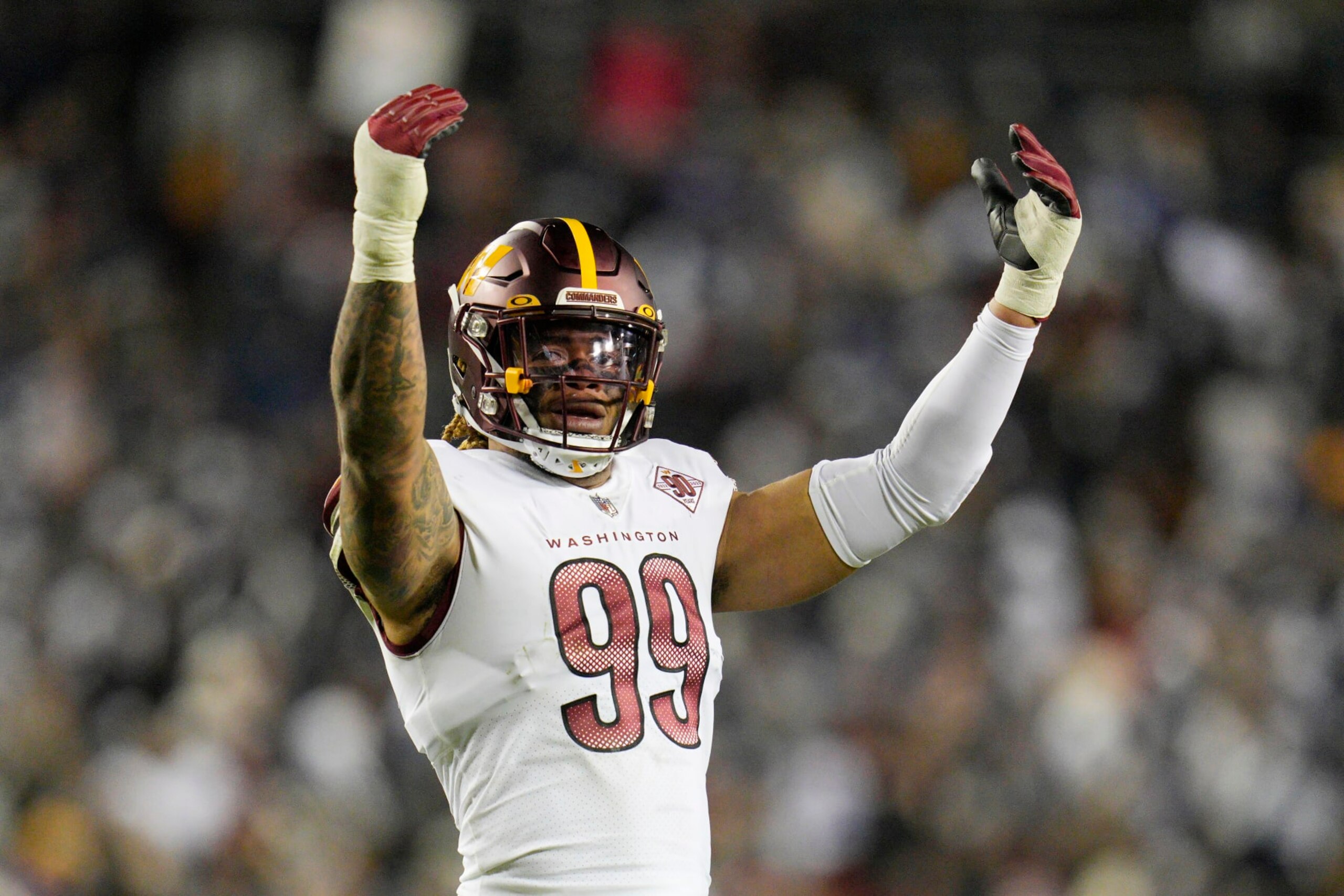 LANDOVER, MARYLAND - JANUARY 08: Chase Young #99 of the Washington Commanders looks on during the first half of the game against the Dallas Cowboys at FedExField on January 08, 2023 in Landover, Maryland. (Photo by Jess Rapfogel/Getty Images) LANDOVER, MARYLAND - JANUARY 08: Chase Young #99 of the Washington Commanders looks on during the first half of the game against the Dallas Cowboys at FedExField on January 08, 2023 in Landover, Maryland. (Photo by Jess Rapfogel/Getty Images)