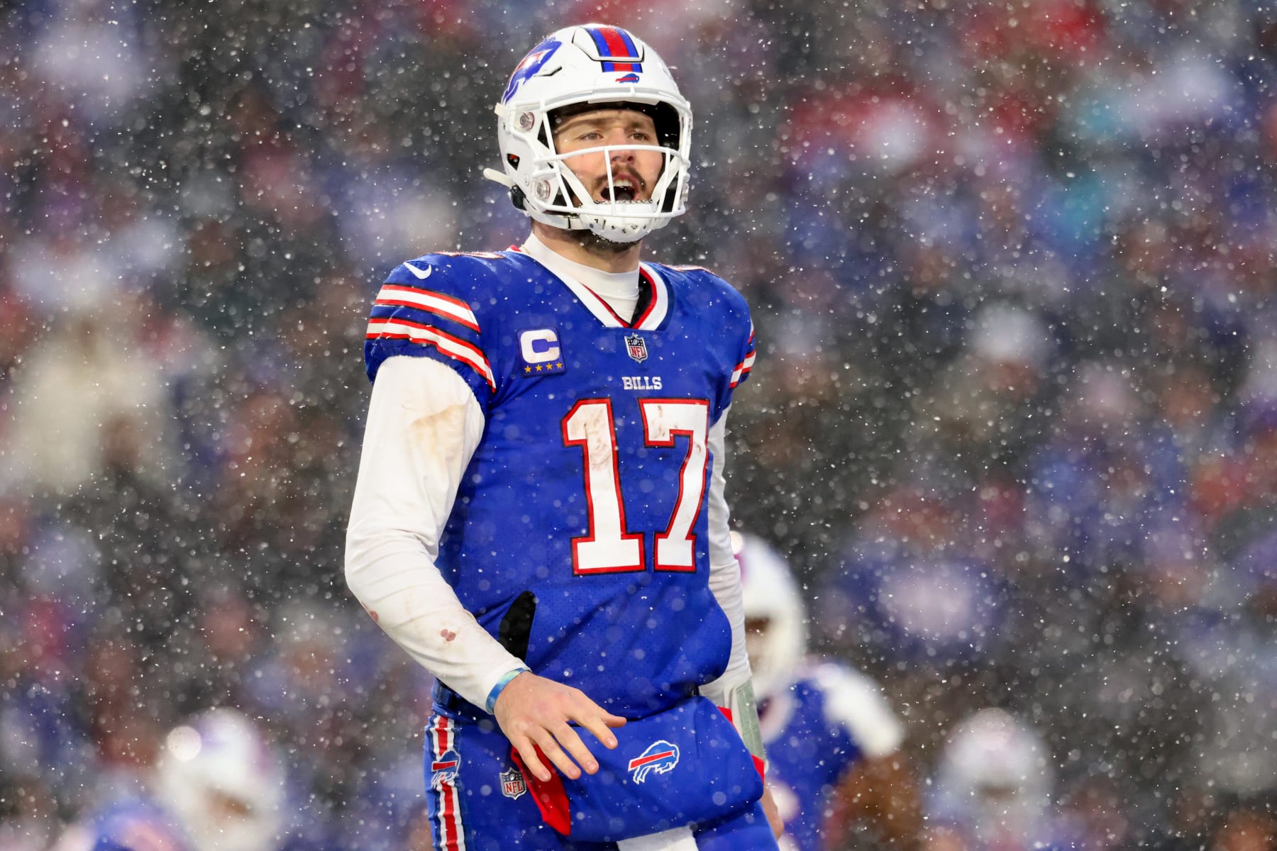 ORCHARD PARK, NEW YORK - JANUARY 22: Josh Allen #17 of the Buffalo Bills reacts against the Cincinnati Bengals during the third quarter in the AFC Divisional Playoff game at Highmark Stadium on January 22, 2023 in Orchard Park, New York. (Photo by Bryan M. Bennett/Getty Images)