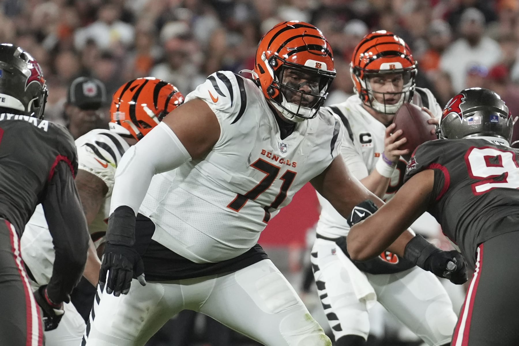 Cincinnati Bengals offensive tackle La'el Collins (71) blocks during an NFL football game against the Tampa Bay Buccaneers, Sunday, Dec. 18, 2022, in Tampa, Fla. (AP Photo/Peter Joneleit)