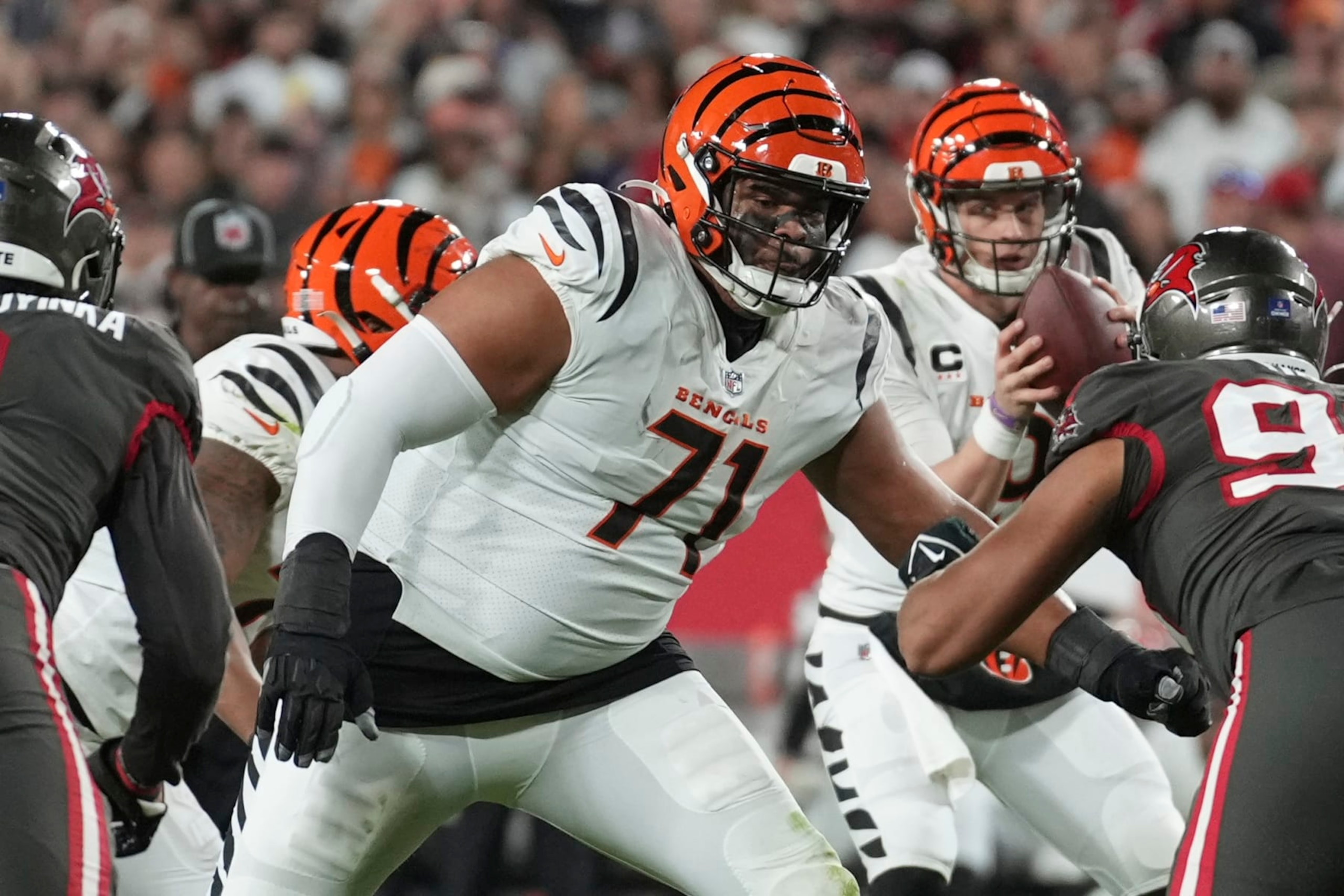 Cincinnati Bengals offensive tackle La'el Collins (71) blocks during an NFL football game against the Tampa Bay Buccaneers, Sunday, Dec. 18, 2022, in Tampa, Fla. (AP Photo/Peter Joneleit)