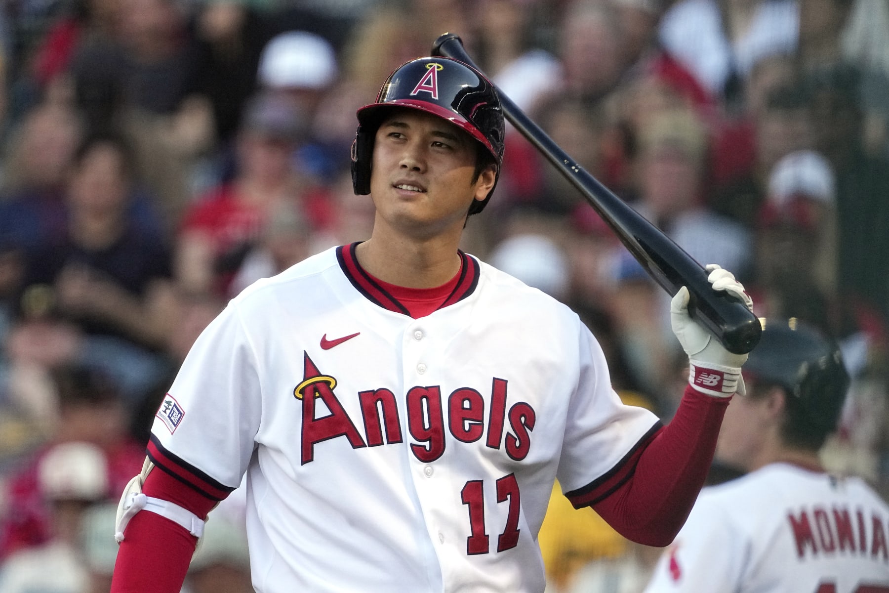 Los Angeles Angels' Shohei Ohtani walks back to the dugout after striking out during the first inning of a baseball game against the Pittsburgh Pirates Saturday, July 22, 2023, in Anaheim, Calif. (AP Photo/Mark J. Terrill)