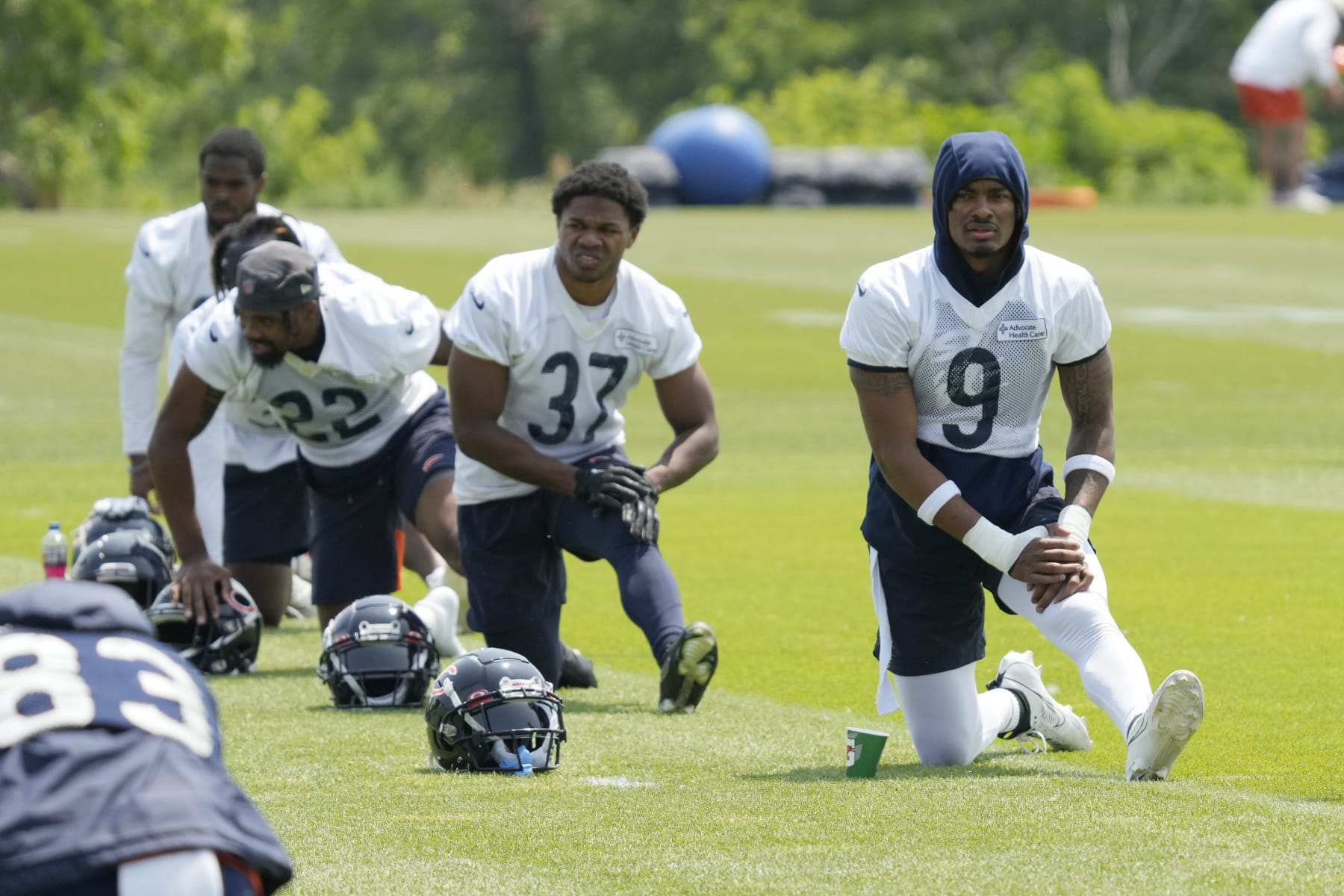Chicago Bears defensive back Jaquan Brisker (9) work on the field with teammates during NFL football OTA practice in Lake Forest, Ill., Wednesday, June 7, 2023. (AP Photo/Nam Y. Huh)