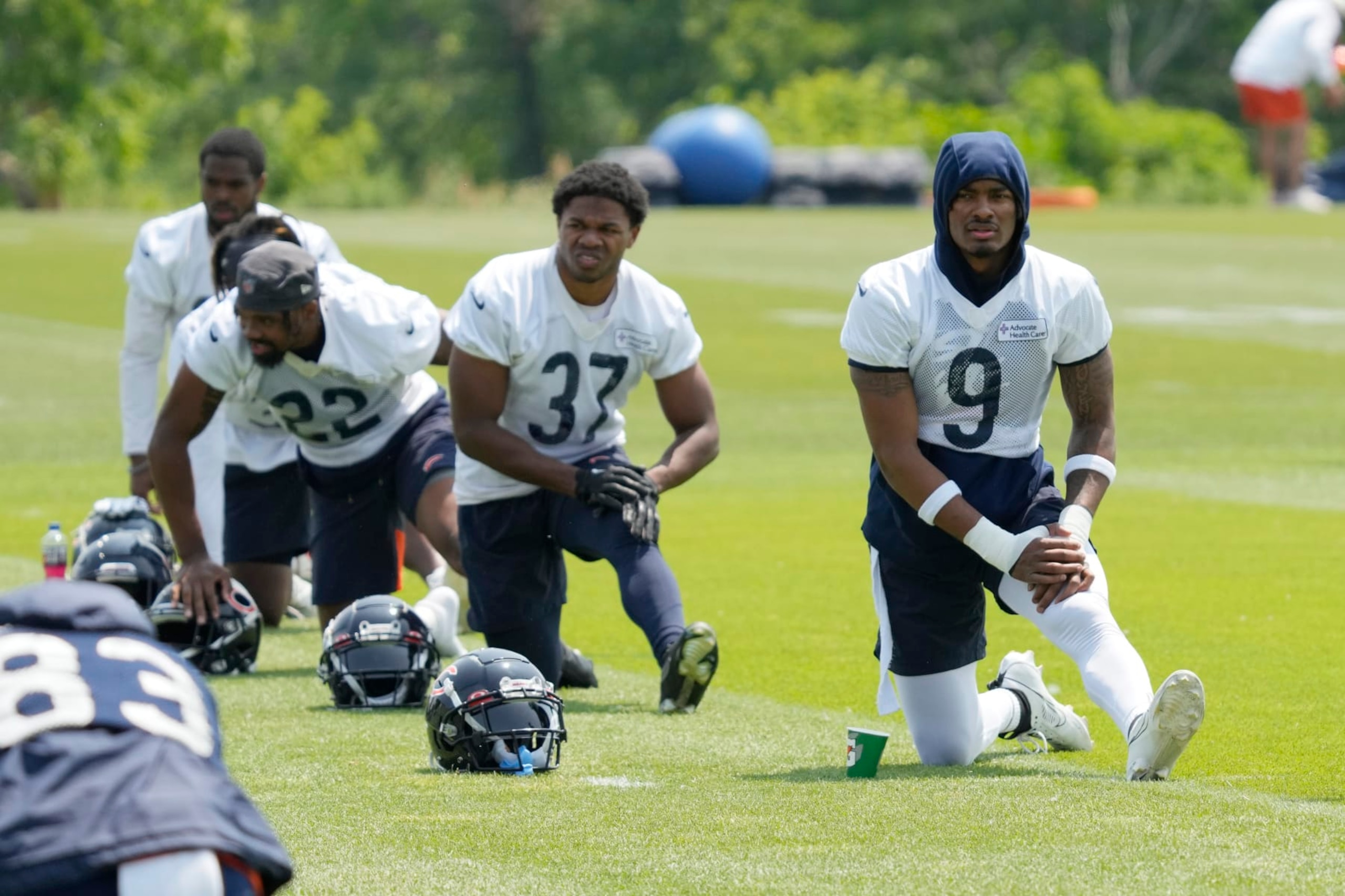 Chicago Bears defensive back Jaquan Brisker (9) work on the field with teammates during NFL football OTA practice in Lake Forest, Ill., Wednesday, June 7, 2023. (AP Photo/Nam Y. Huh)