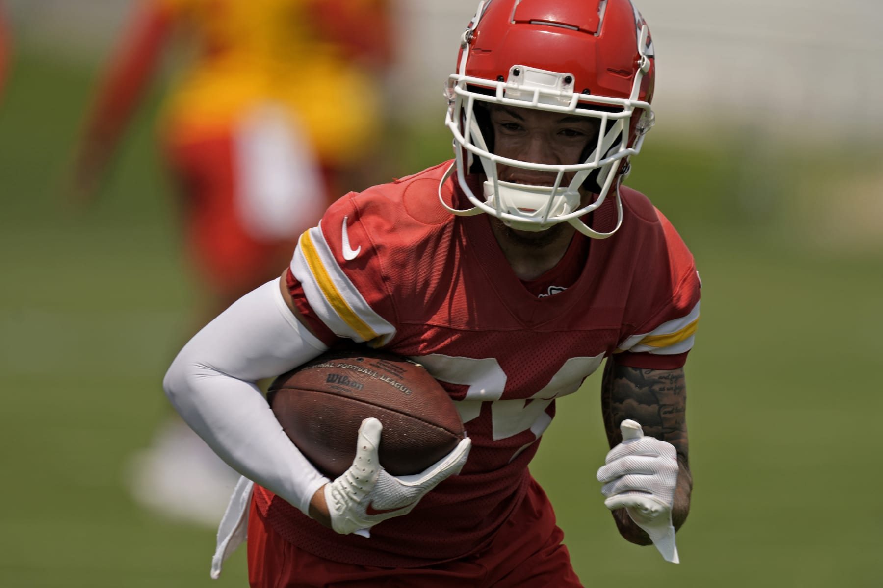 Kansas City Chiefs wide receiver Skyy Moore participates in a drill during the NFL football team's organized team activities Thursday, June 1, 2023, in Kansas City, Mo. (AP Photo/Charlie Riedel)