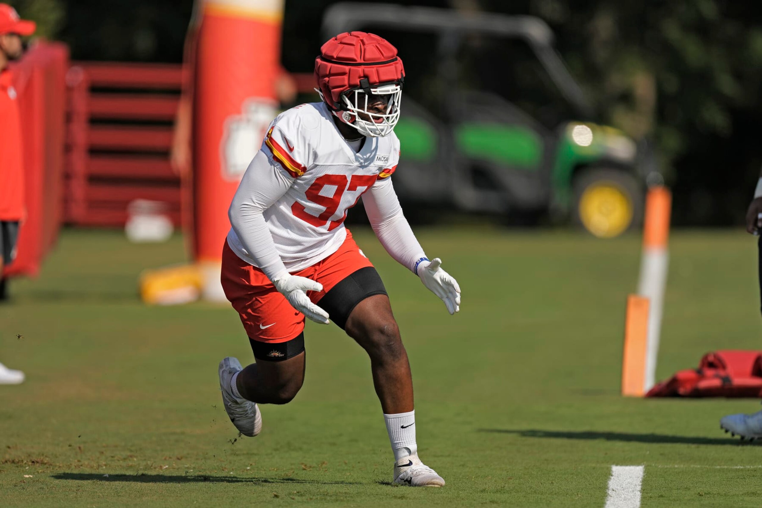 Kansas City Chiefs defensive end Felix Anudike-Uzomah runs a drill at NFL football training camp Sunday, July 23, 2023, in St. Joseph, Mo. (AP Photo/Charlie Riedel)