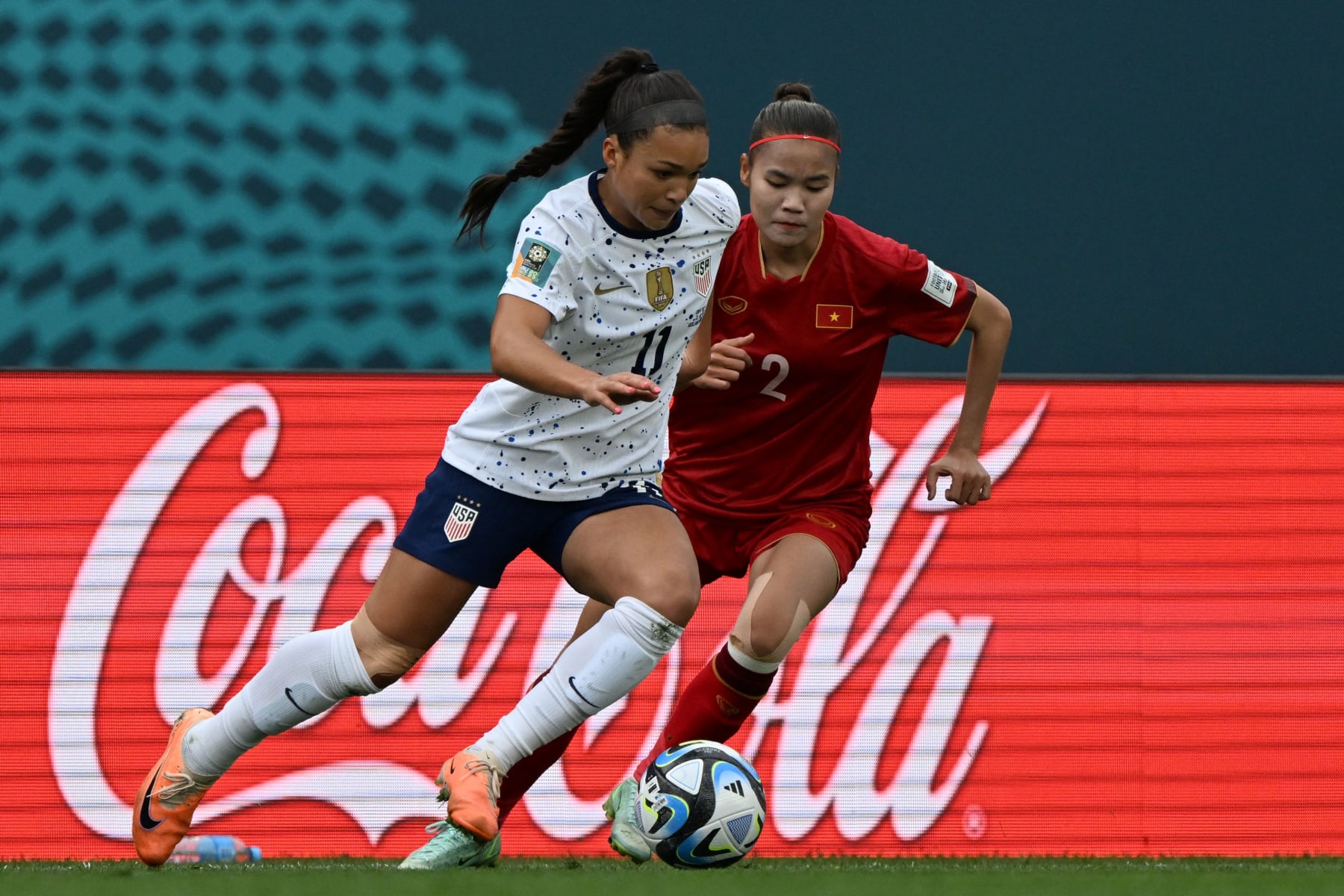 USA's forward #11 Sophia Smith fights for the ball with Vietnam's defender #02 Thi Thu Thuong Luong during the Australia and New Zealand 2023 Women's World Cup Group E football match between the United States and Vietnam at Eden Park in Auckland on July 22, 2023. (Photo by Saeed KHAN / AFP) (Photo by SAEED KHAN/AFP via Getty Images)
