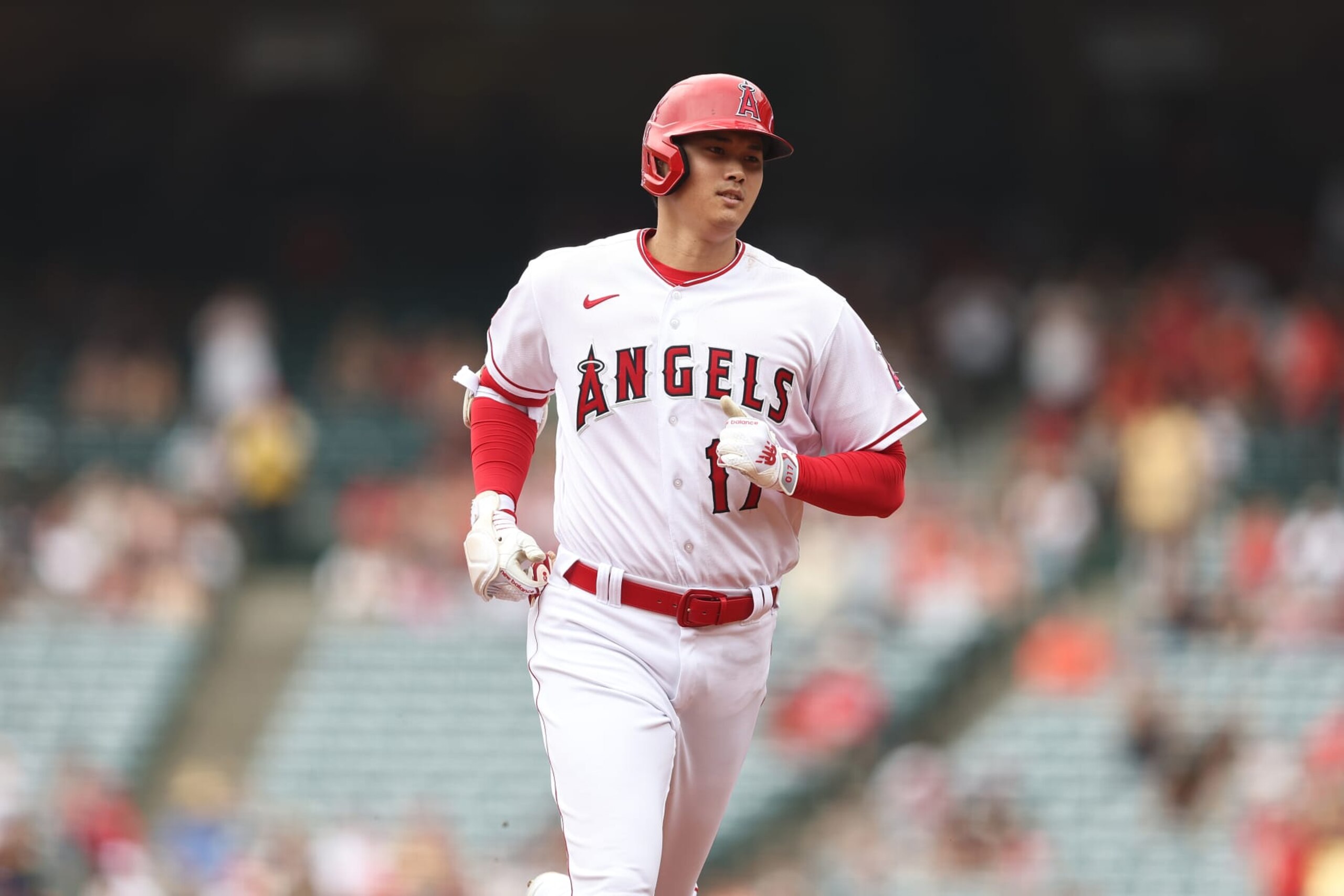 ANAHEIM, CALIFORNIA - JULY 23: Shohei Ohtani #17 of the Los Angeles Angels rounds the bases after hitting a solo home run against the Pittsburgh Pirates during the first inning at Angel Stadium of Anaheim on July 23, 2023 in Anaheim, California. (Photo by Michael Owens/Getty Images)