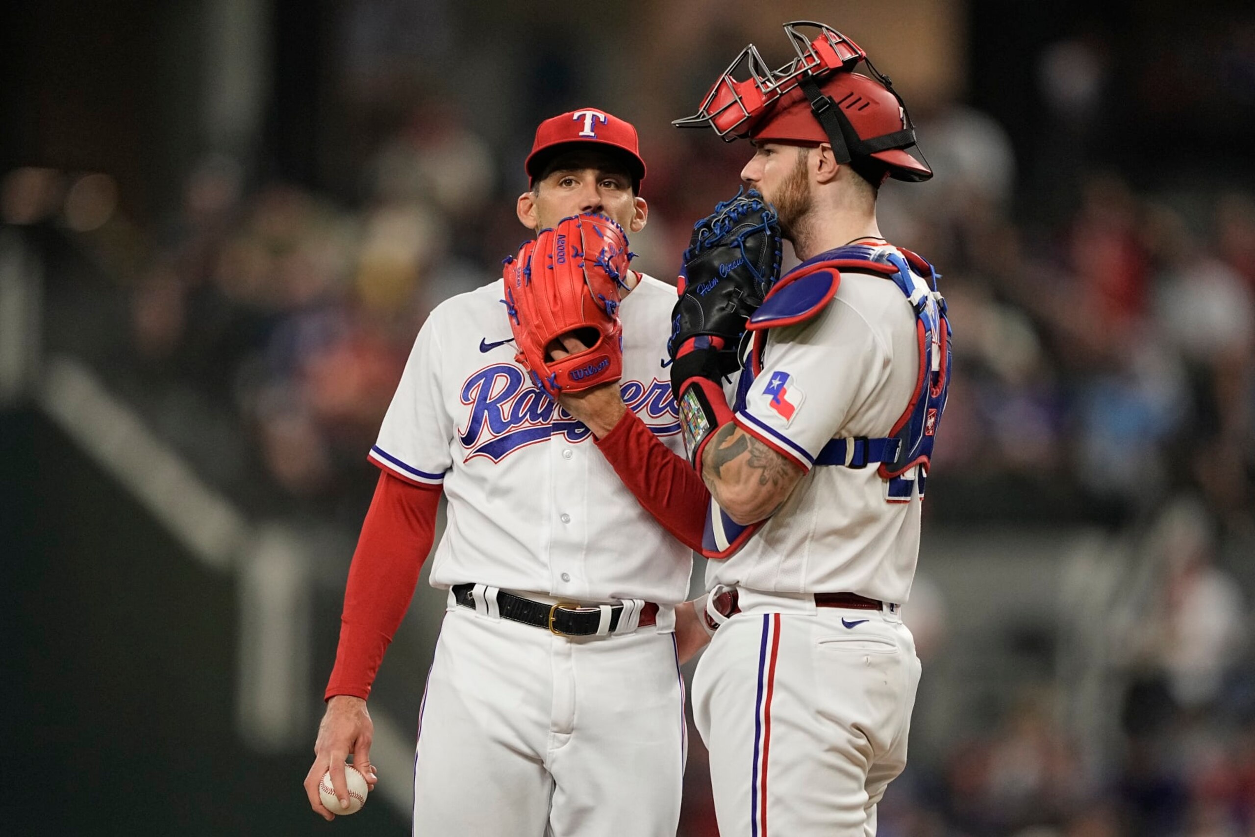 Nathan Eovaldi (L) and Jonah Heim (R)