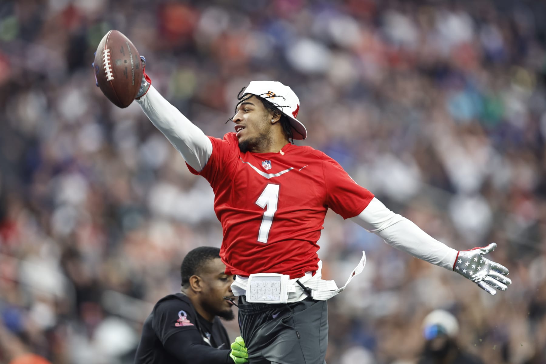 LAS VEGAS, NEVADA - FEBRUARY 05: LAS VEGAS, NEVADA - FEBRUARY 05: AFC wide receiver Ja'Marr Chase #1 of the Cincinnati Bengals jumps and reaches for a touchdown during an NFL Pro Bowl football game at Allegiant Stadium on February 05, 2023 in Las Vegas, Nevada. (Photo by Michael Owens/Getty Images)