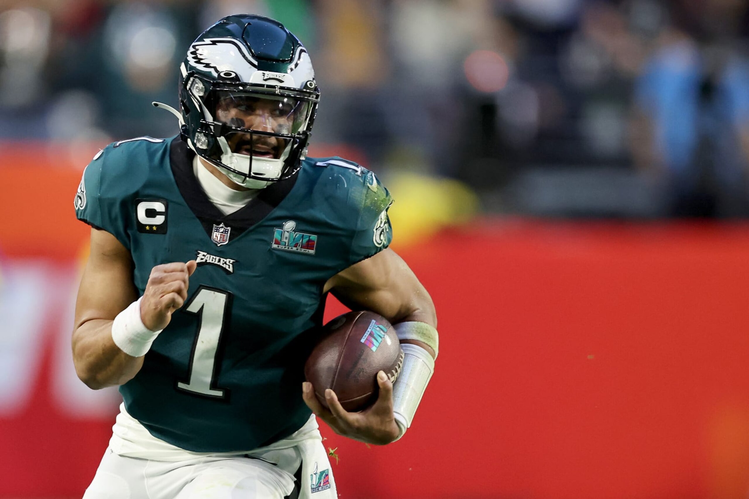 GLENDALE, ARIZONA - FEBRUARY 12: Jalen Hurts #1 of the Philadelphia Eagles runs the ball against the Kansas City Chiefs during the first quarter in Super Bowl LVII at State Farm Stadium on February 12, 2023 in Glendale, Arizona. (Photo by Gregory Shamus/Getty Images)