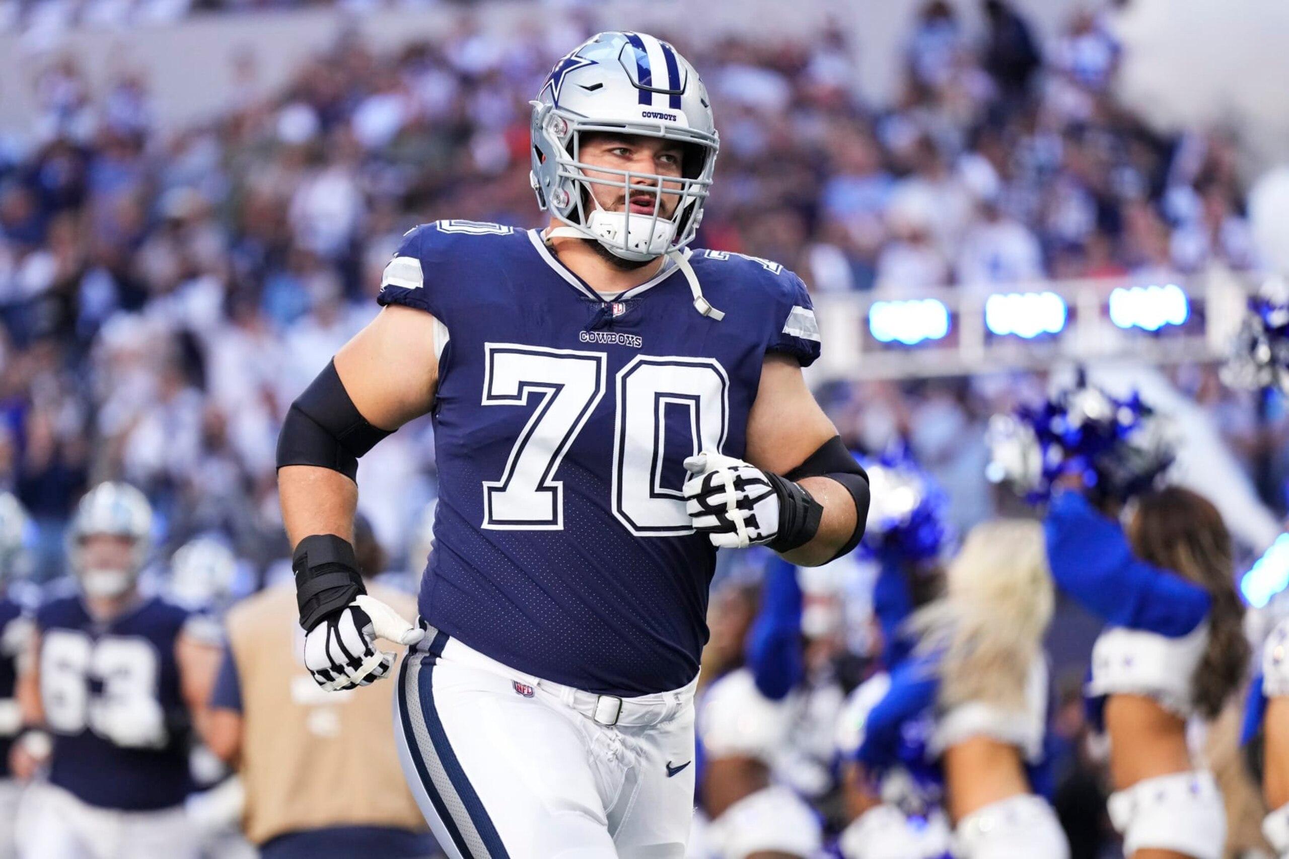 ARLINGTON, TX - OCTOBER 30: Zack Martin #70 of the Dallas Cowboys runs out during introductions against the Chicago Bears at AT&T Stadium on October 30, 2022 in Arlington, Texas. (Photo by Cooper Neill/Getty Images)
