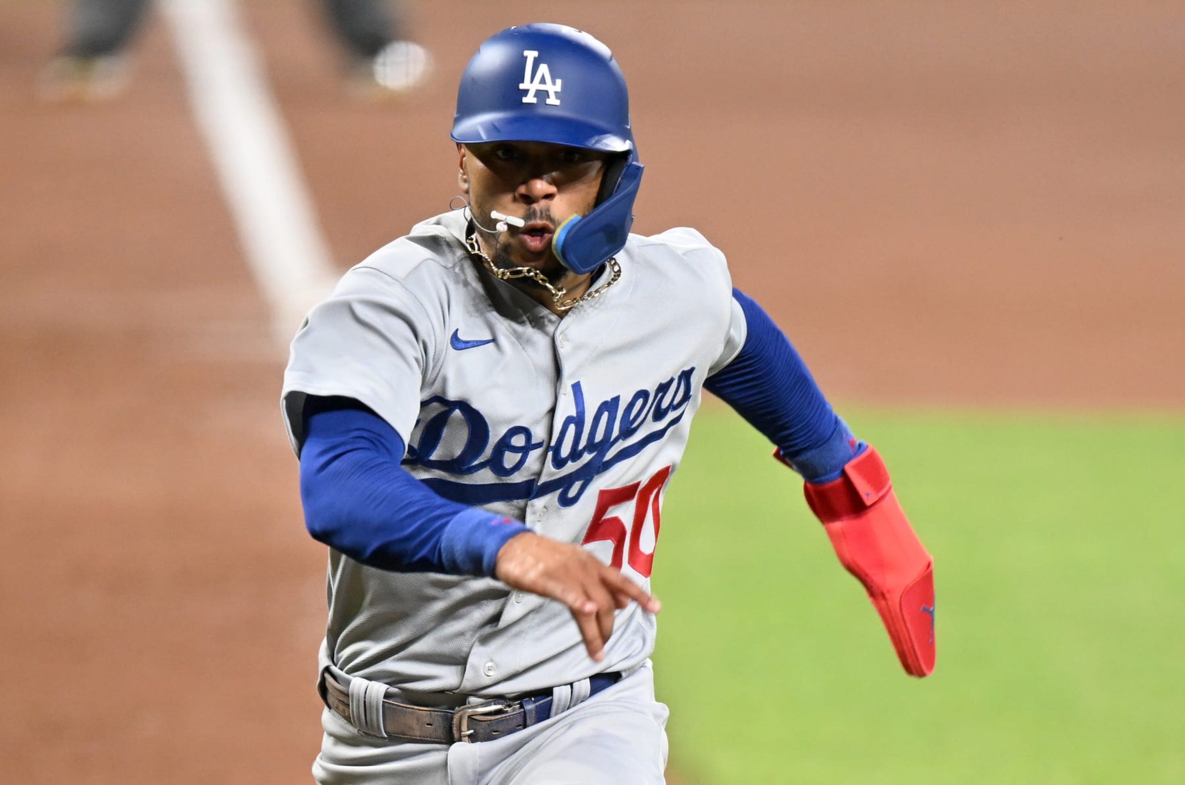 BALTIMORE, MARYLAND - JULY 18: Mookie Betts #50 of the Los Angeles Dodgers runs down the third base line during the game against the Baltimore Orioles at Oriole Park at Camden Yards on July 18, 2023 in Baltimore, Maryland. (Photo by G Fiume/Getty Images)
