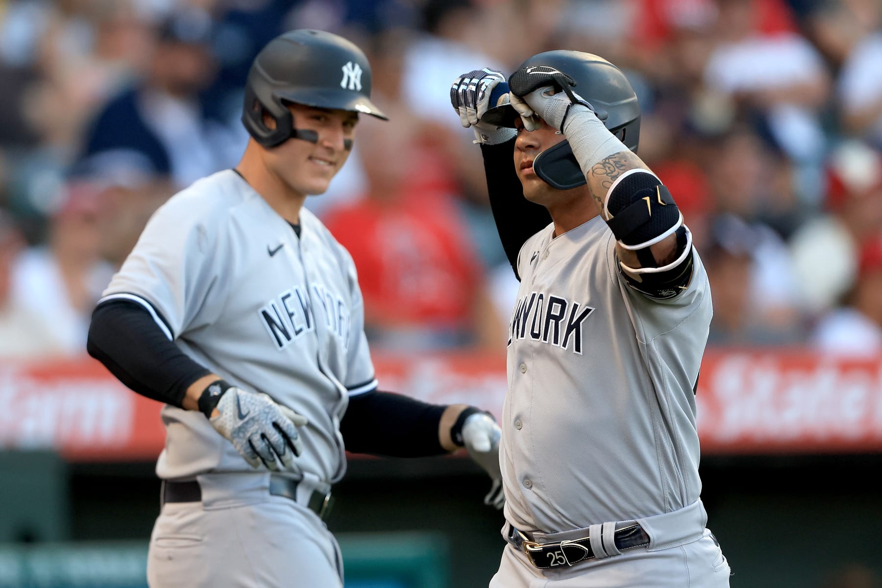 ANAHEIM, CALIFORNIA - JULY 18: Anthony Rizzo #48 congratulates Gleyber Torres #25 of the New York Yankees after he connect for a solo homerun during the third inning of a game against the Los Angeles Angels at Angel Stadium of Anaheim on July 18, 2023 in Anaheim, California. (Photo by Sean M. Haffey/Getty Images)