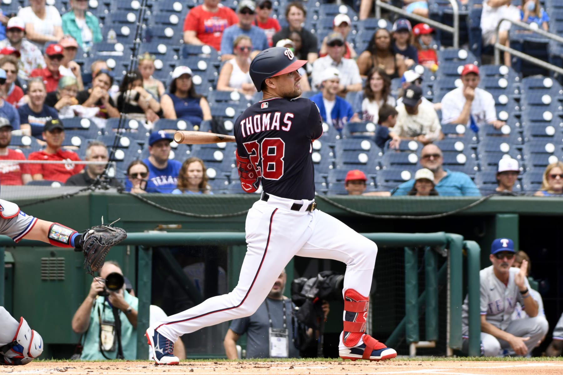 WASHINGTON, DC - JULY 09, 2023: Lane Thomas #28 of the Washington Nationals bats during the first inning against the Texas Rangers at Nationals Park on July 9, 2023 in Washington, DC. (Photo by Diamond Images via Getty Images)