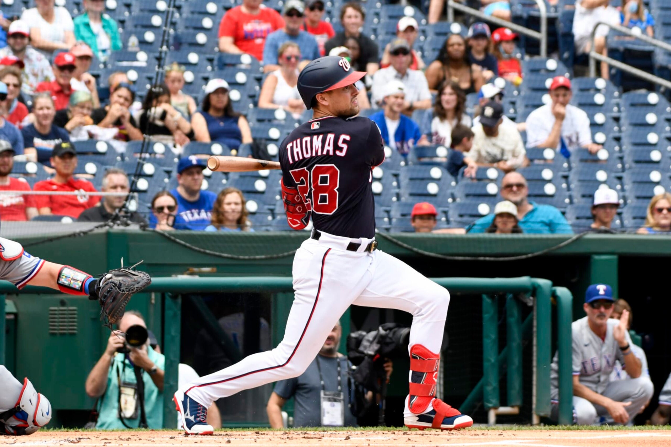 WASHINGTON, DC - JULY 09, 2023: Lane Thomas #28 of the Washington Nationals bats during the first inning against the Texas Rangers at Nationals Park on July 9, 2023 in Washington, DC. (Photo by Diamond Images via Getty Images)