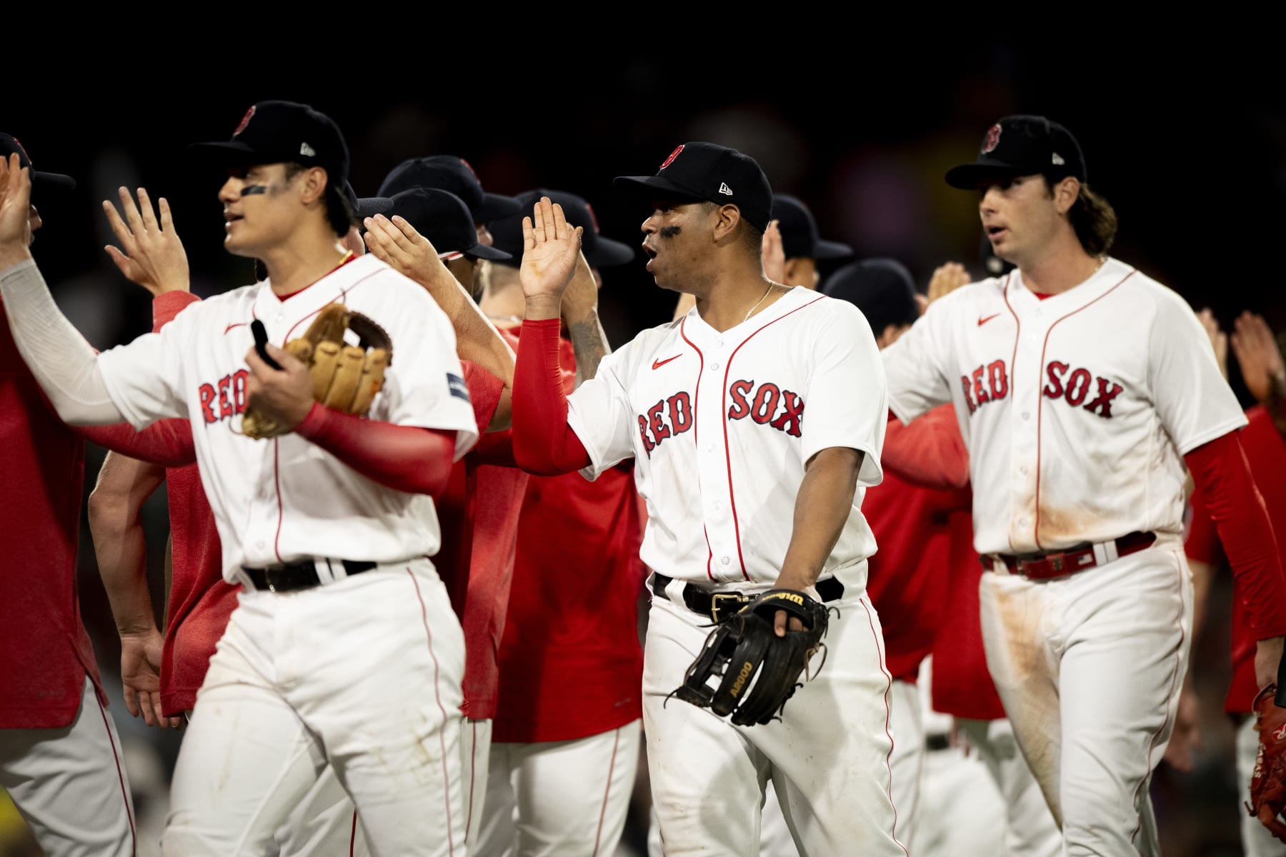 BOSTON, MA - JULY 23: Rafael Devers #11 of the Boston Red Sox reacts with teammates after a win against the New York Mets on July 23, 2023 at Fenway Park in Boston, Massachusetts. (Photo by Maddie Malhotra/Boston Red Sox/Getty Images) BOSTON, MA - JULY 23: Rafael Devers #11 of the Boston Red Sox reacts with teammates after a win against the New York Mets on July 23, 2023 at Fenway Park in Boston, Massachusetts. (Photo by Maddie Malhotra/Boston Red Sox/Getty Images)