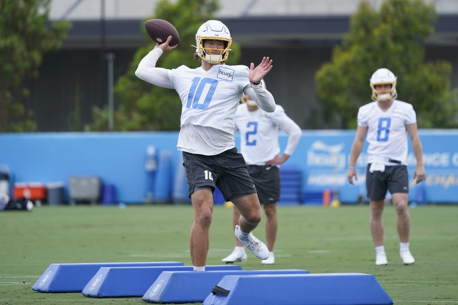 Los Angeles Chargers quarterback Justin Herbert (10) runs a drill during the NFL football team's camp in Costa Mesa, Calif., Wednesday, June 14, 2023. (AP Photo/Jae C. Hong)