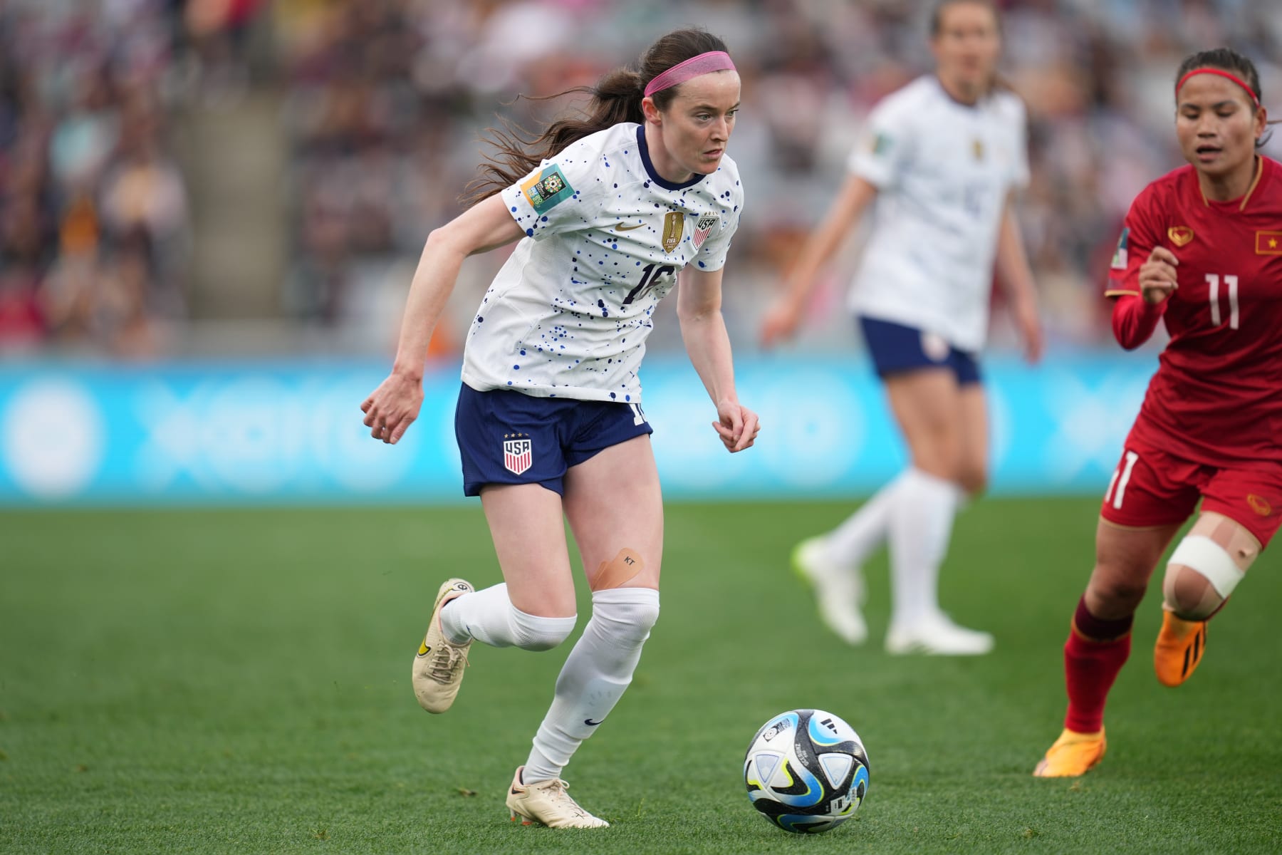 AUCKLAND, NEW ZEALAND - JULY 22: Rose Lavelle #16 of the United States advances the ball during the second half of the FIFA Women's World Cup Australia & New Zealand 2023 Group E match between USA and Vietnam at Eden Park on July 22, 2023 in Auckland, New Zealand. (Photo by Robin Alam/USSF/Getty Images ) AUCKLAND, NEW ZEALAND - JULY 22: Rose Lavelle #16 of the United States advances the ball during the second half of the FIFA Women's World Cup Australia & New Zealand 2023 Group E match between USA and Vietnam at Eden Park on July 22, 2023 in Auckland, New Zealand. (Photo by Robin Alam/USSF/Getty Images )
