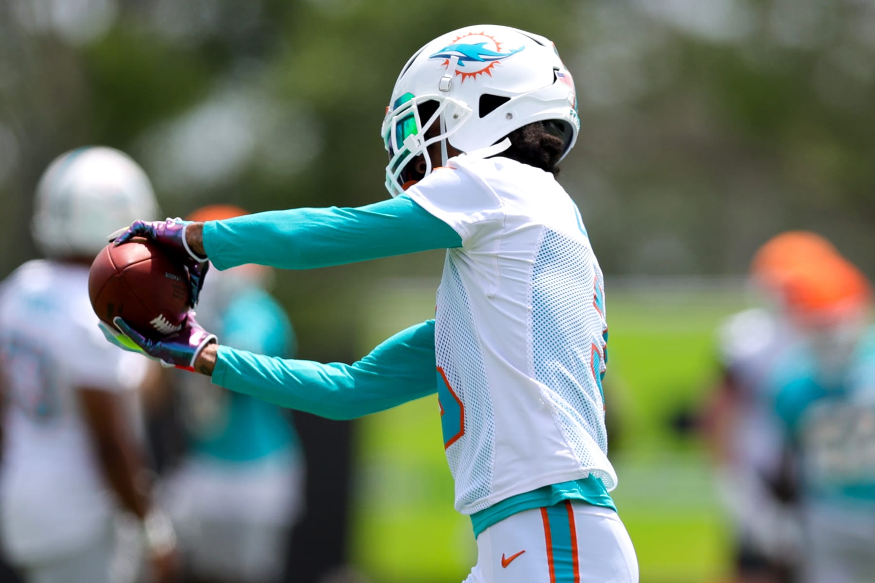 MIAMI GARDENS, FLORIDA - JUNE 08: Robbie Chosen #3 of the Miami Dolphins takes part in a drill during practice at Baptist Health Training Complex on June 08, 2023 in Miami Gardens, Florida. (Photo by Megan Briggs/Getty Images)