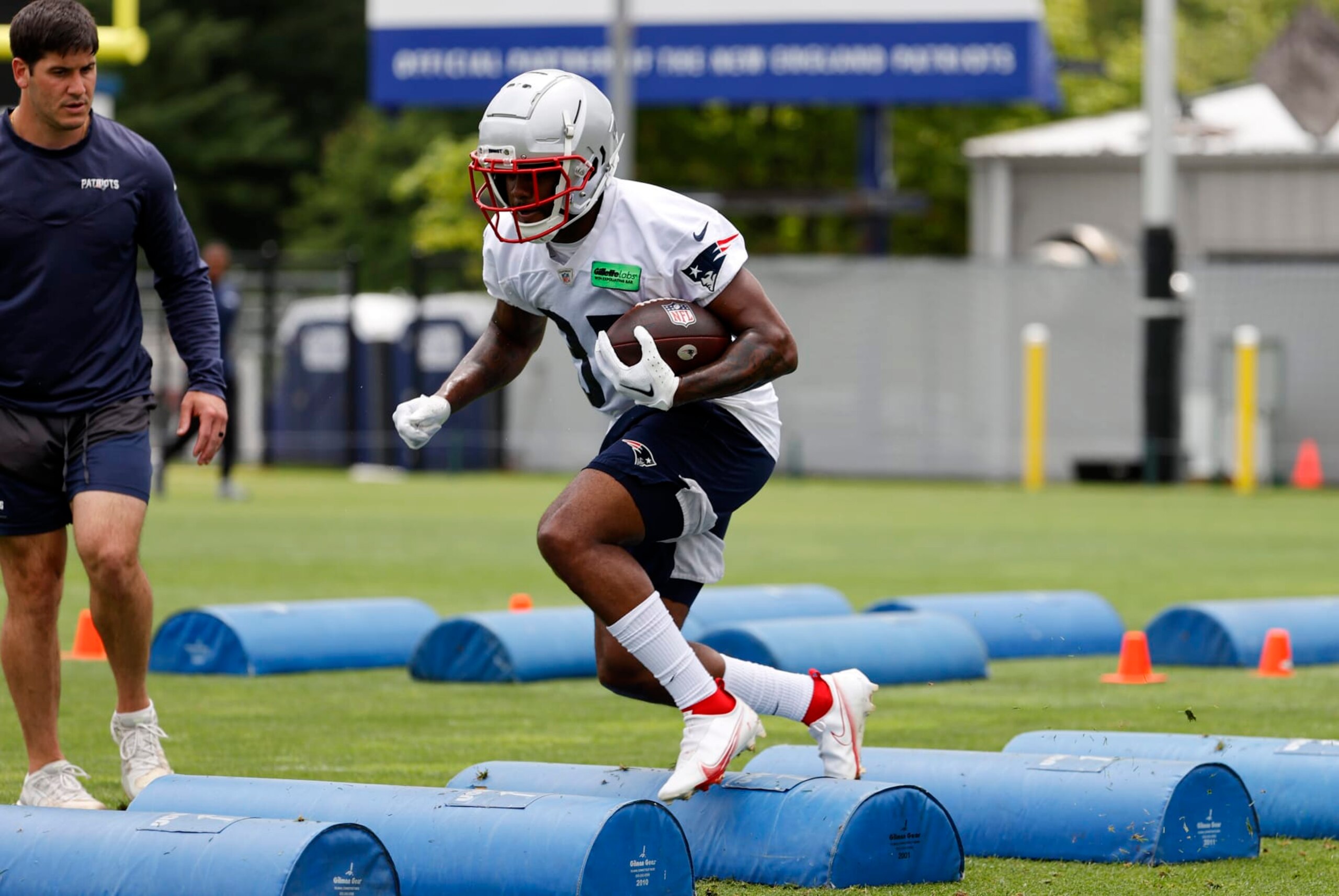 FOXBOROUGH, MA - JUNE 13: New England Patriots running back Pierre Strong Jr. (35) carries the ball over the speed bumps during New England Patriots Minicamp on June 13, 2023, at the Patriots Practice Facility at Gillette Stadium in Foxborough, Massachusetts. (Photo by Fred Kfoury III/Icon Sportswire via Getty Images)