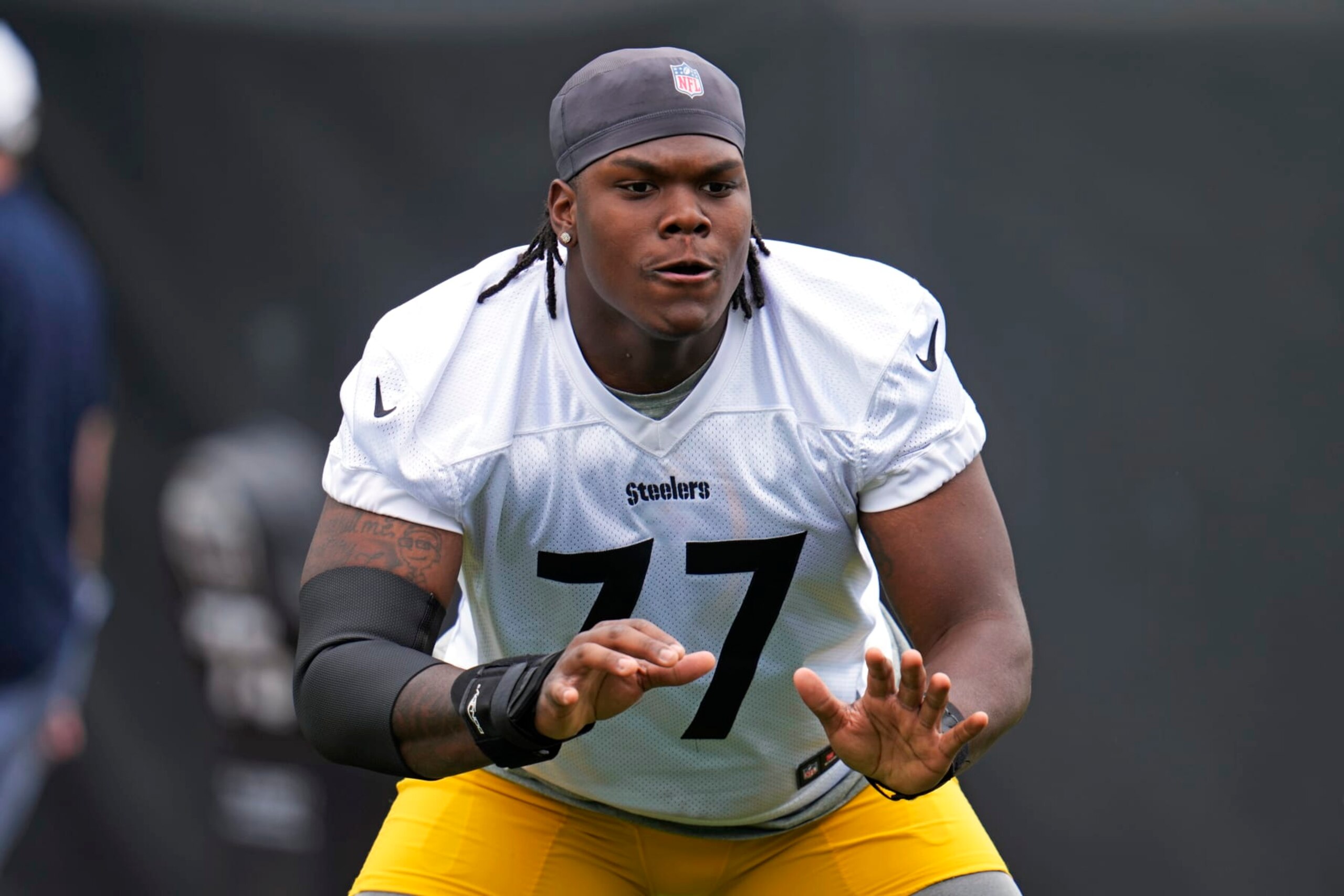 Pittsburgh Steelers offensive tackle and first-round draft pick Broderick Jones participates in a drill during the first day of the NFL football team's minicamp, in Pittsburgh on Tuesday, June 13, 2023. (AP Photo/Gene J. Puskar)
