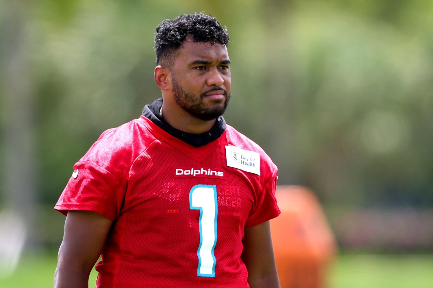 MIAMI GARDENS, FLORIDA - JUNE 08: Tua Tagovailoa #1 of the Miami Dolphins looks on during practice at Baptist Health Training Complex on June 08, 2023 in Miami Gardens, Florida. (Photo by Megan Briggs/Getty Images)