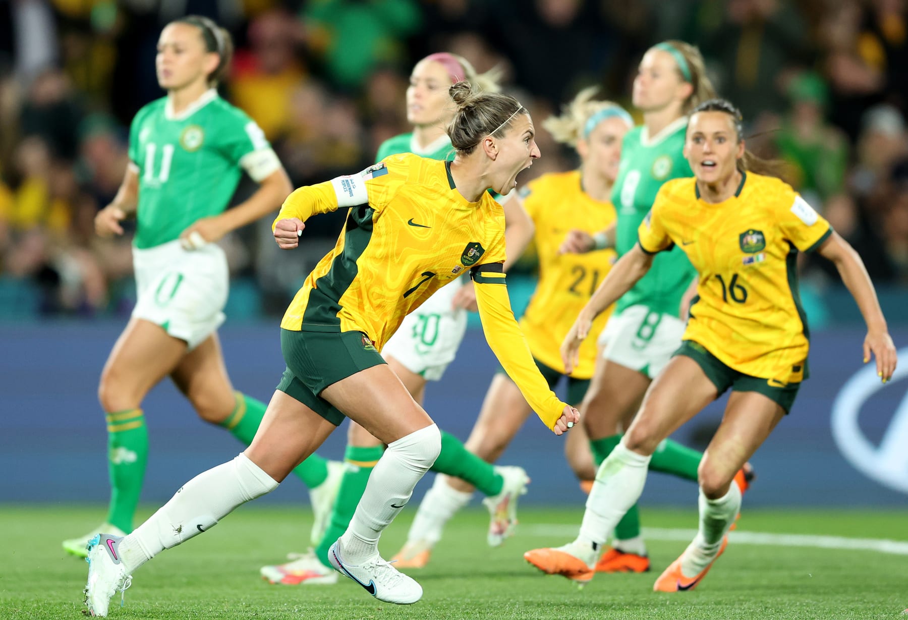 SYDNEY, AUSTRALIA - JULY 20: Steph Catley of Australia celebrates after scoring her team's first goal during the FIFA Women's World Cup Australia & New Zealand 2023 Group B match between Australia and Ireland at Stadium Australia on July 20, 2023 in Sydney / Gadigal, Australia. (Photo by Mark Metcalfe - FIFA/FIFA via Getty Images)