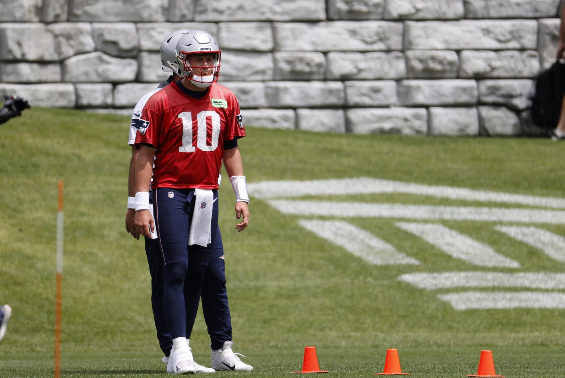FOXBOROUGH, MA - JUNE 13: New England Patriots quarterback Mac Jones (10) waits to begin an agility drill during New England Patriots Minicamp on June 13, 2023, at the Patriots Practice Facility at Gillette Stadium in Foxborough, Massachusetts. (Photo by Fred Kfoury III/Icon Sportswire via Getty Images)