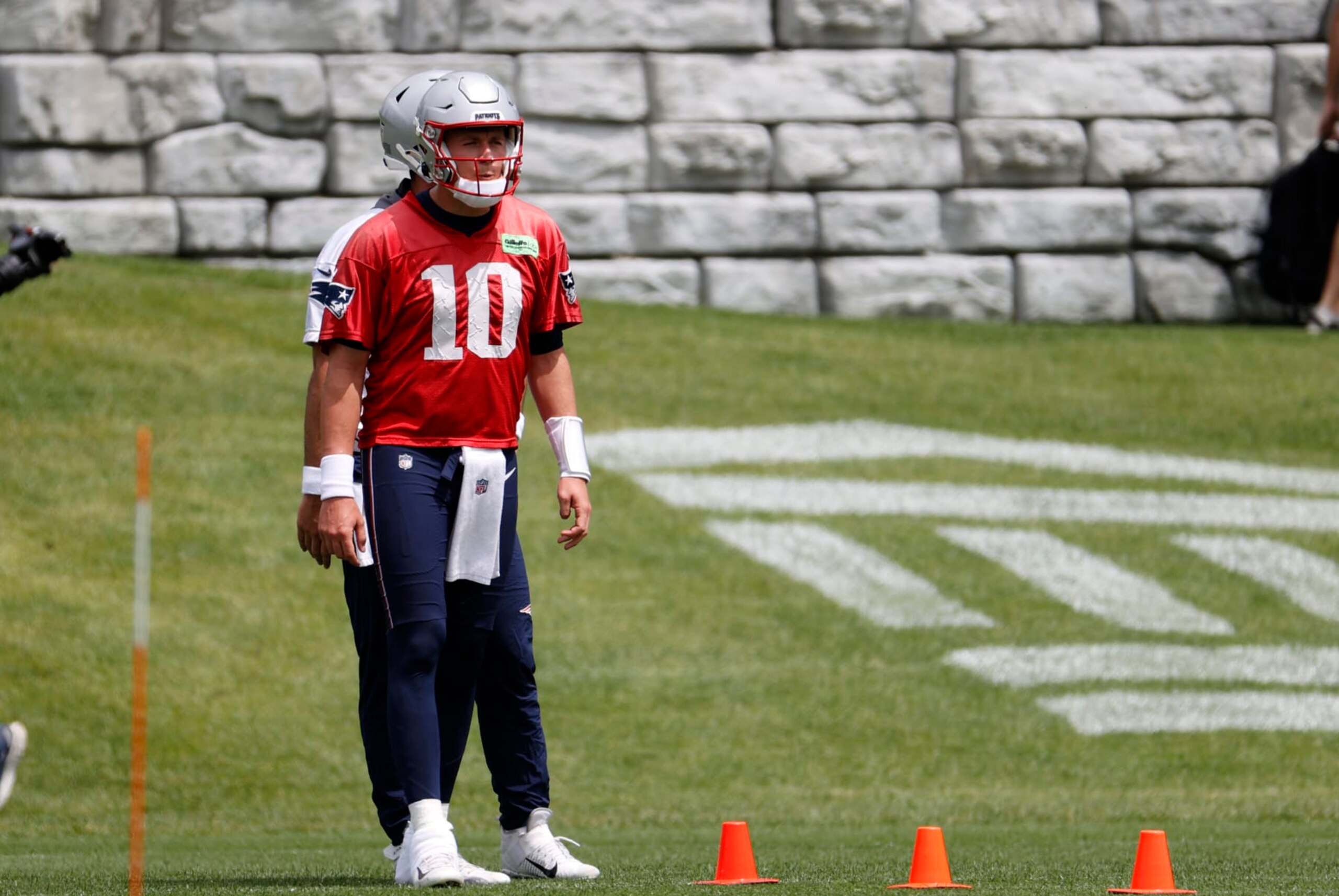 FOXBOROUGH, MA - JUNE 13: New England Patriots quarterback Mac Jones (10) waits to begin an agility drill during New England Patriots Minicamp on June 13, 2023, at the Patriots Practice Facility at Gillette Stadium in Foxborough, Massachusetts. (Photo by Fred Kfoury III/Icon Sportswire via Getty Images)