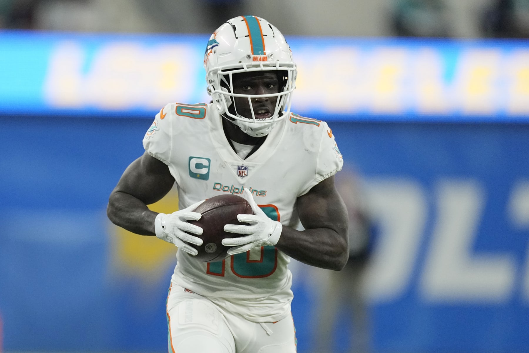 Miami Dolphins wide receiver Tyreek Hill catches a touchdown during the second half of an NFL football game against the Los Angeles Chargers Sunday, Dec. 11, 2022, in Inglewood, Calif. (AP Photo/Mark J. Terrill)