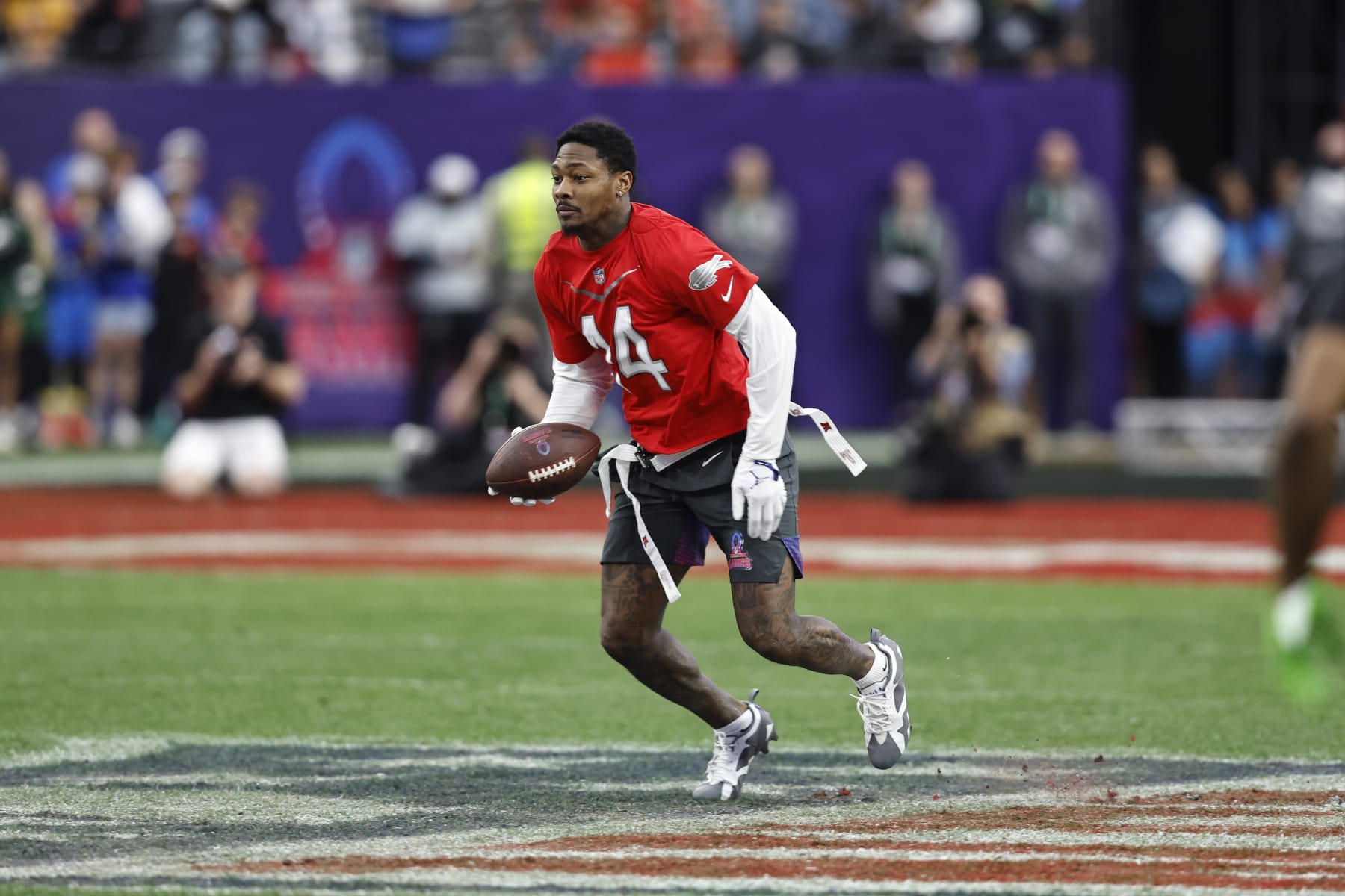 LAS VEGAS, NEVADA - FEBRUARY 05: LAS VEGAS, NEVADA - FEBRUARY 05: AFC wide receiver Stefon Diggs #14 of the Buffalo Bills runs with the ball during an NFL Pro Bowl football game at Allegiant Stadium on February 05, 2023 in Las Vegas, Nevada. (Photo by Michael Owens/Getty Images)
