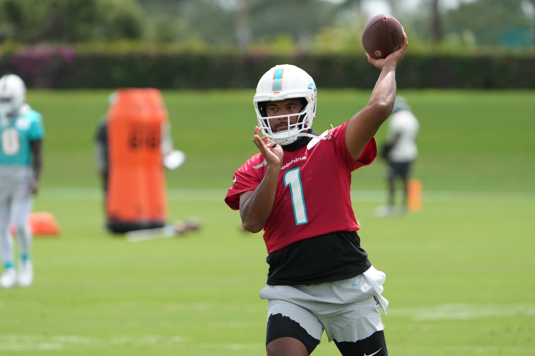 MIAMI GARDENS, FL - JUNE 08: Miami Dolphins quarterback Tua Tagovailoa (1) throws at targets during the Miami Dolphins OTA on Thursday, June 8, 2023 at Baptist Health Training Facility in Miami Gardens Fla. (Photo by Peter Joneleit/Icon Sportswire via Getty Images)