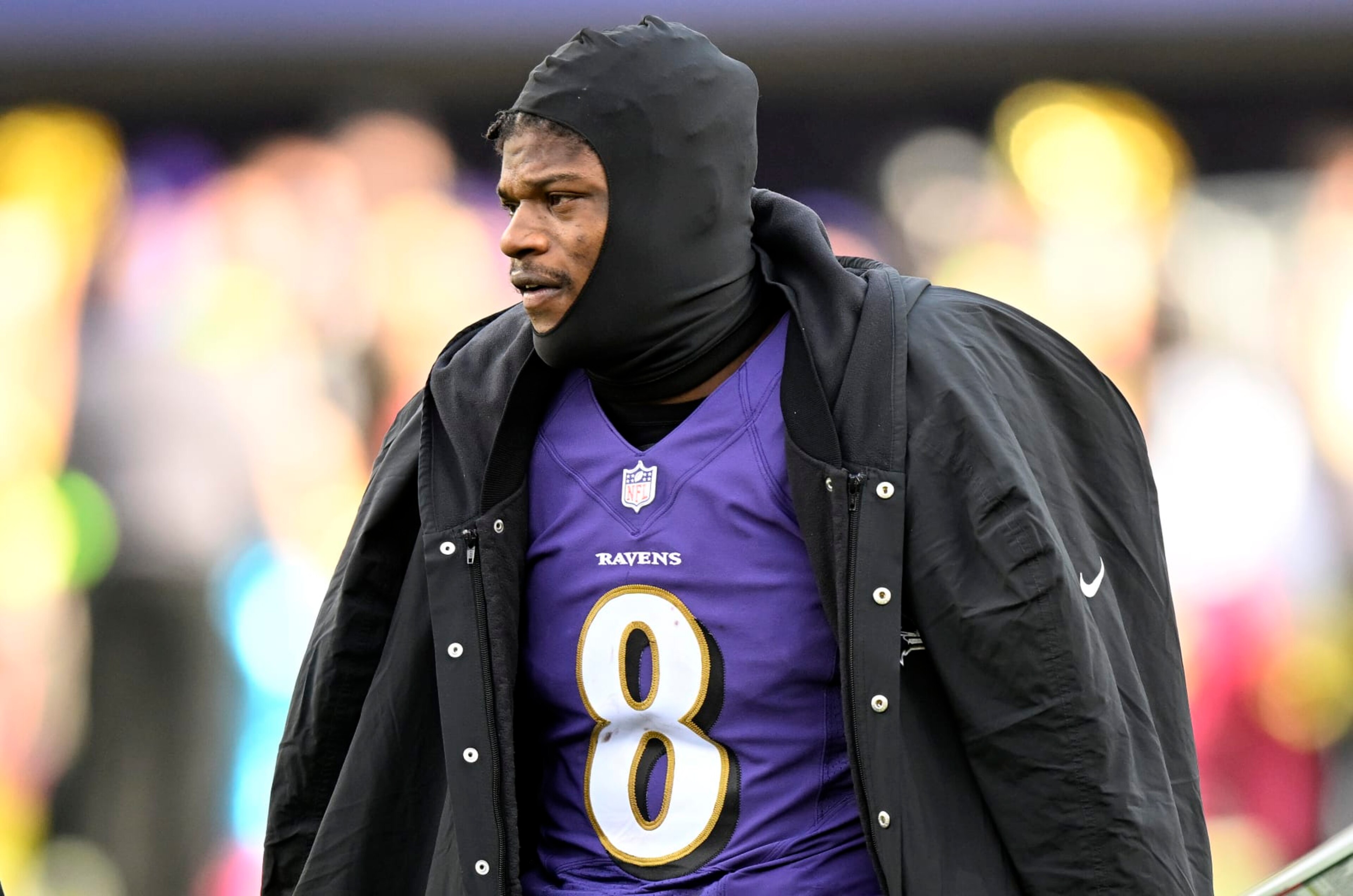 BALTIMORE, MARYLAND - DECEMBER 04: Lamar Jackson #8 of the Baltimore Ravens watches the game against the Denver Broncos at M&T Bank Stadium on December 04, 2022 in Baltimore, Maryland. (Photo by G Fiume/Getty Images)