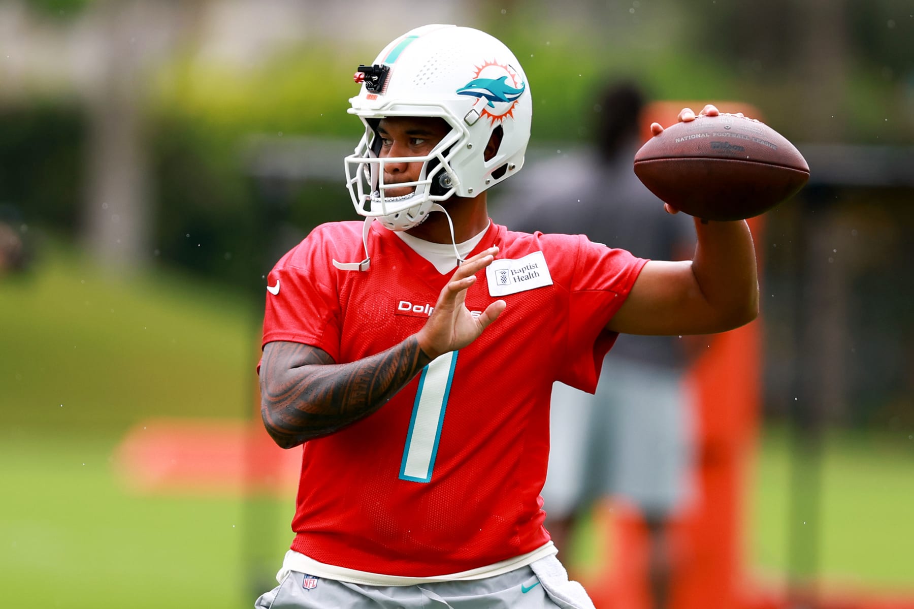 MIAMI GARDENS, FLORIDA - JULY 26: Tua Tagovailoa #1 of the Miami Dolphins throws a pass during training camp at Baptist Health Training Complex on July 26, 2023 in Miami Gardens, Florida. (Photo by Megan Briggs/Getty Images)