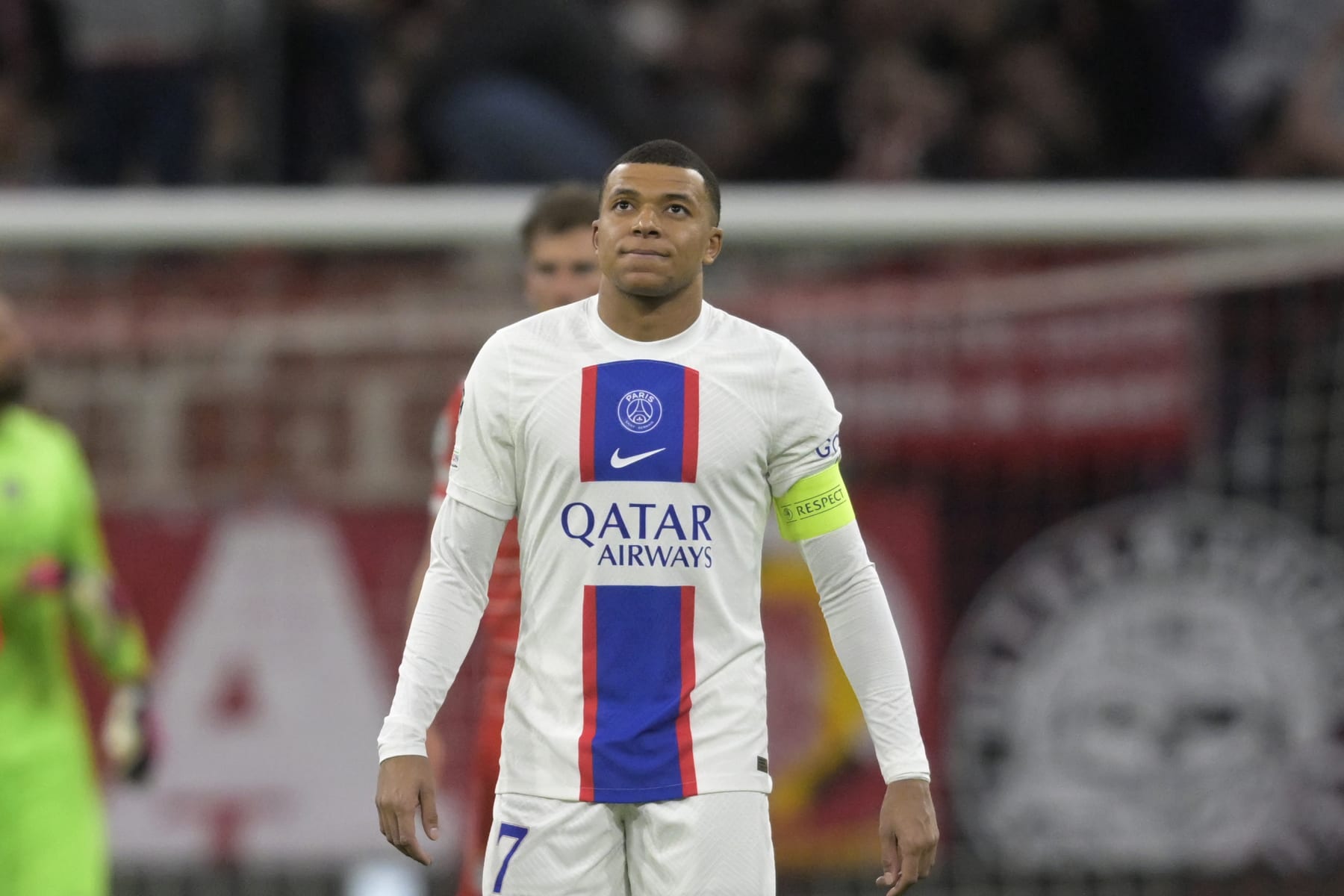 PSG's Kylian Mbappe reacts after Bayern's Eric Maxim Choupo-Moting scored his side's opening goal during the Champions League round of 16 second leg soccer match between Bayern Munich and Paris Saint Germain at the Allianz Arena in Munich, Germany, Wednesday, March 8, 2023. (AP Photo/Andreas Schaad)