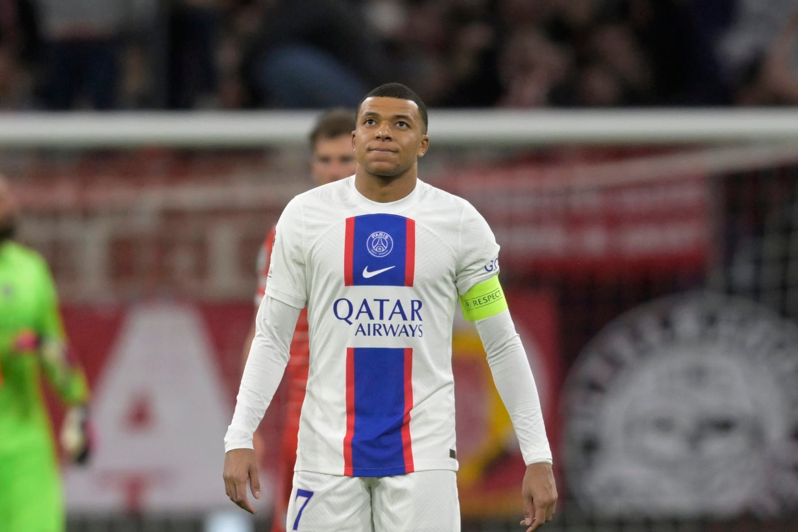 PSG's Kylian Mbappe reacts after Bayern's Eric Maxim Choupo-Moting scored his side's opening goal during the Champions League round of 16 second leg soccer match between Bayern Munich and Paris Saint Germain at the Allianz Arena in Munich, Germany, Wednesday, March 8, 2023. (AP Photo/Andreas Schaad)