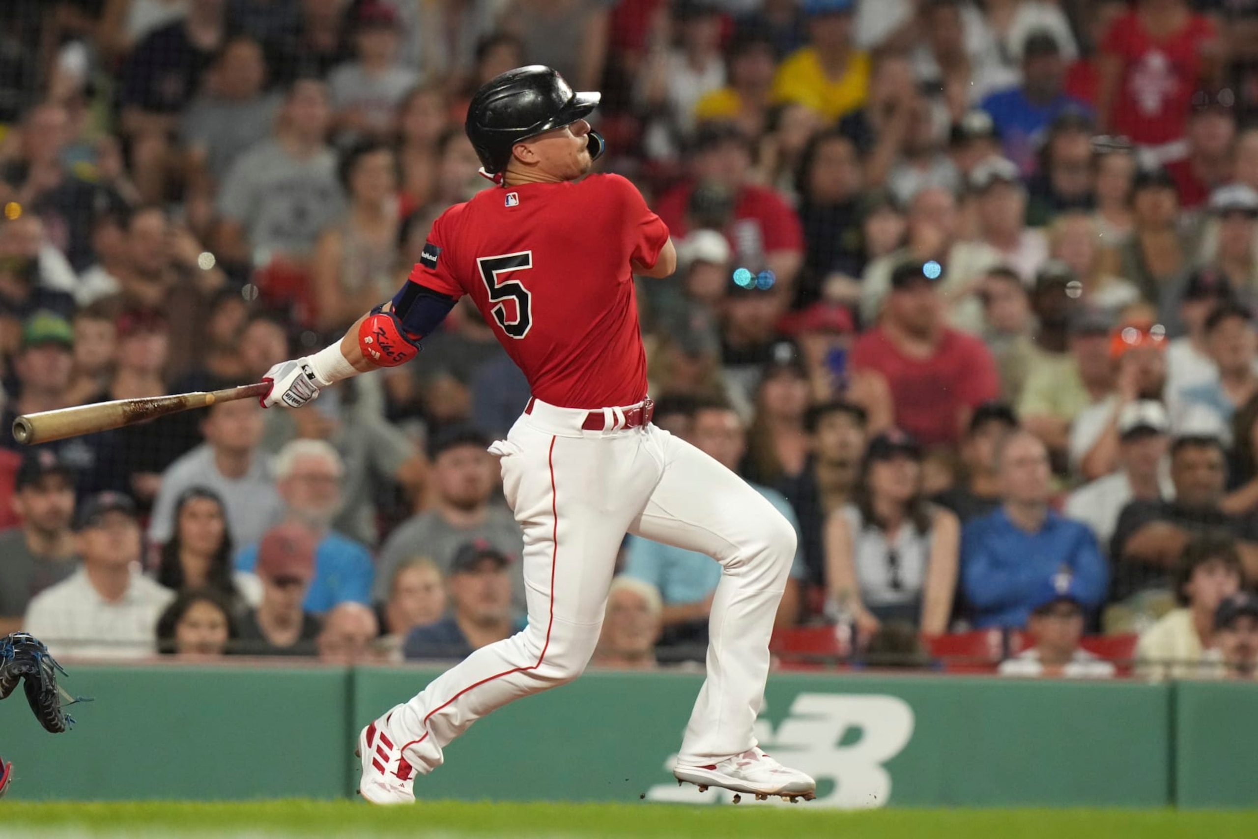 Boston Red Sox's Enrique Hernandez follows though on his swing after hitting a two-run single in the seventh inning of a baseball game against the Texas Rangers, Thursday, July 6, 2023, in Boston. (AP Photo/Steven Senne)