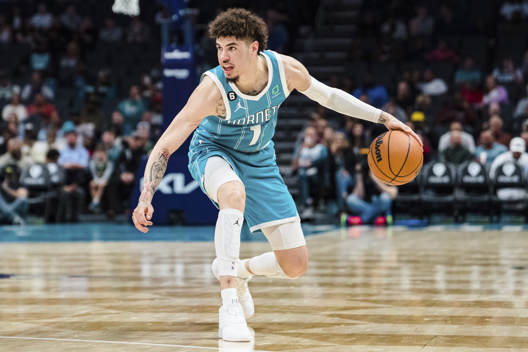 Charlotte Hornets guard LaMelo Ball brings the ball up court during the second half of an NBA basketball game against the Detroit Pistons in Charlotte, N.C., Monday, Feb. 27, 2023. (AP Photo/Jacob Kupferman)
