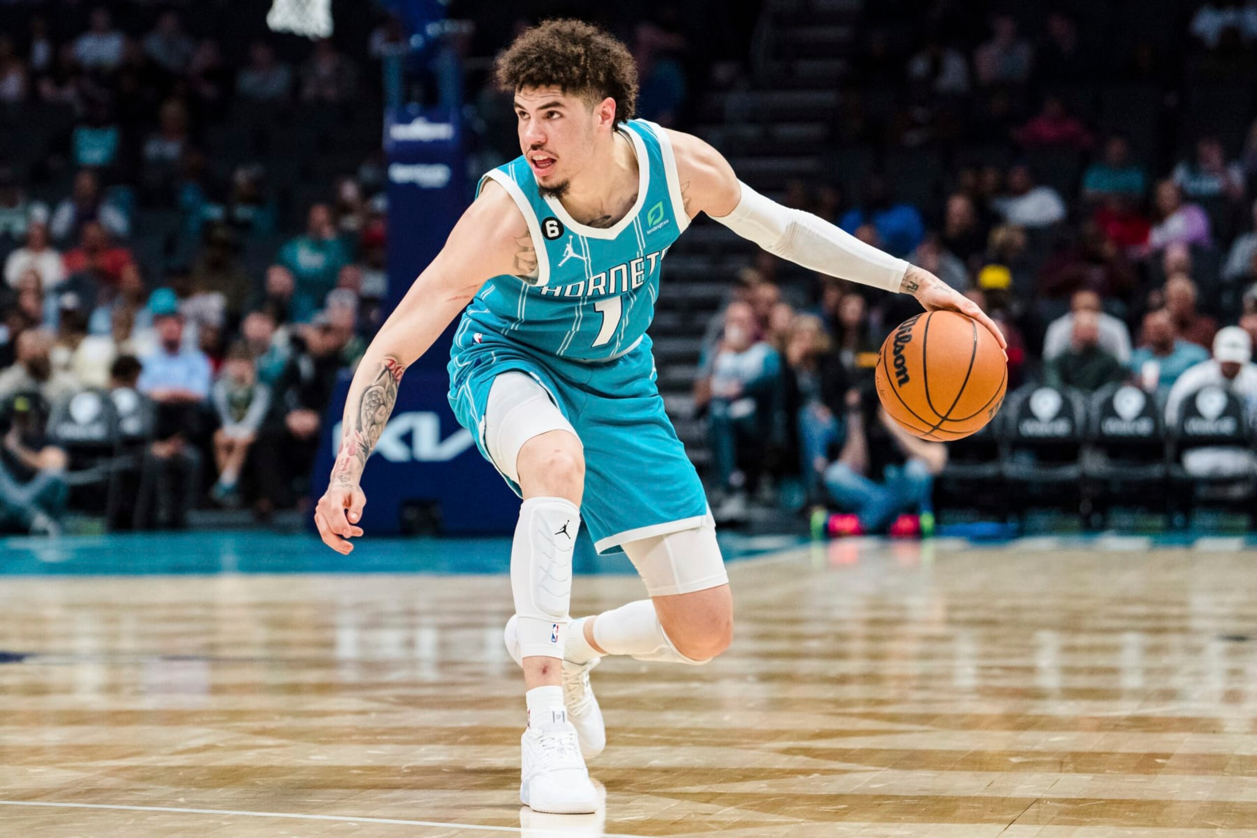 Charlotte Hornets guard LaMelo Ball brings the ball up court during the second half of an NBA basketball game against the Detroit Pistons in Charlotte, N.C., Monday, Feb. 27, 2023. (AP Photo/Jacob Kupferman)