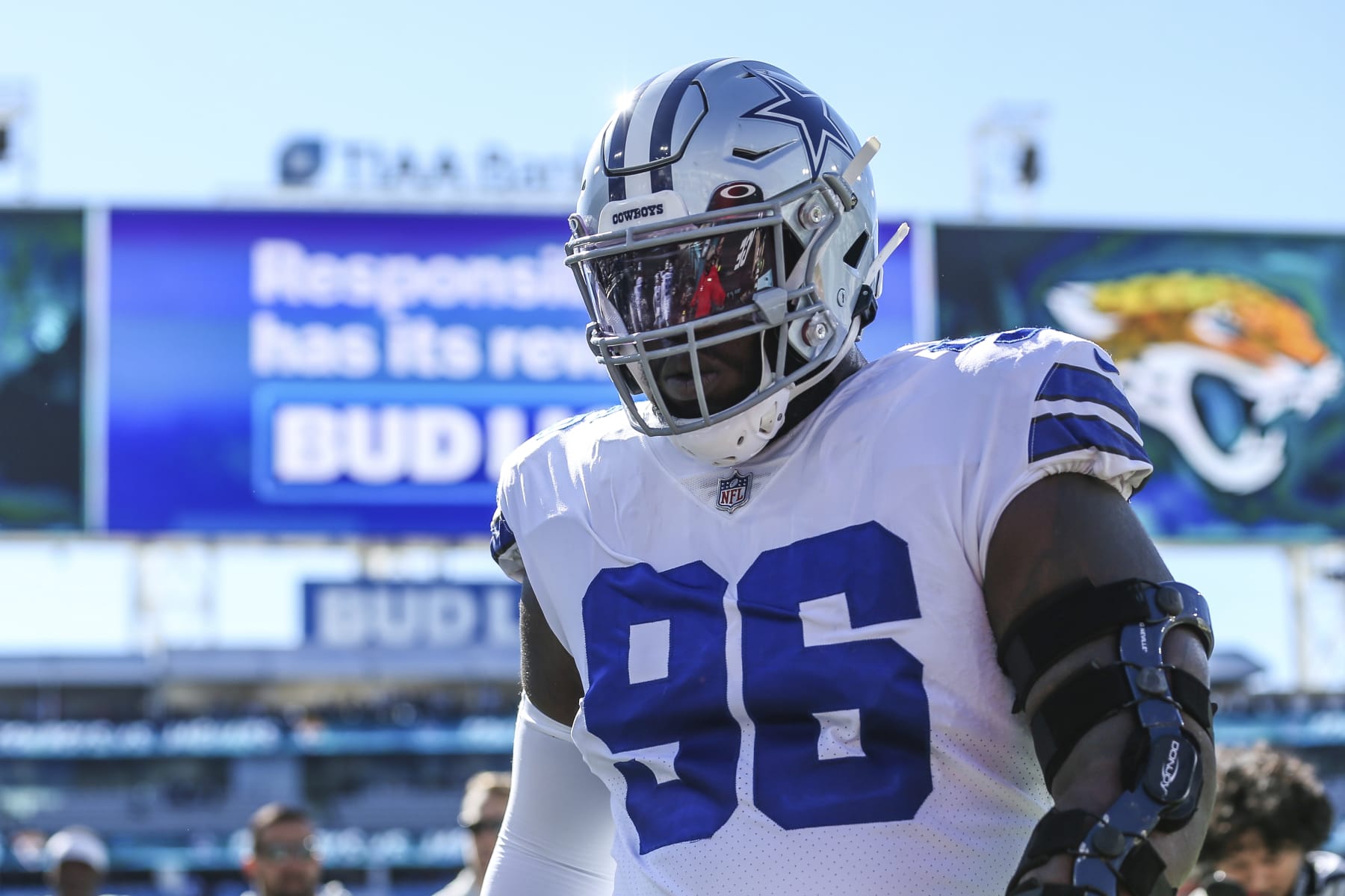 Dallas Cowboys defensive tackle Neville Gallimore (96) walks off the field after warm-ups before an NFL football game against the Jacksonville Jaguars, Sunday, Dec. 18, 2022, in Jacksonville, Fla. (AP Photo/Gary McCullough)