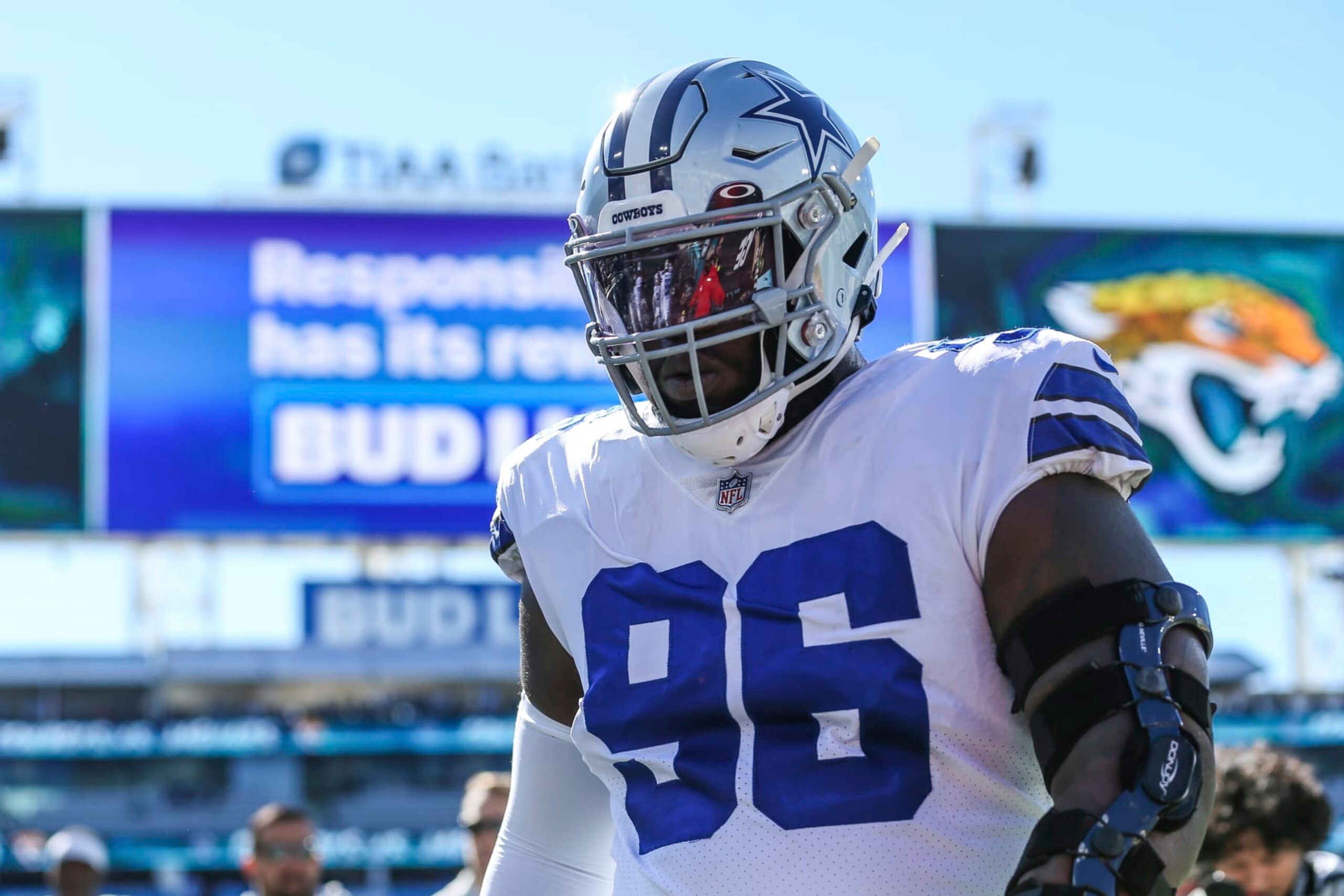 Dallas Cowboys defensive tackle Neville Gallimore (96) walks off the field after warm-ups before an NFL football game against the Jacksonville Jaguars, Sunday, Dec. 18, 2022, in Jacksonville, Fla. (AP Photo/Gary McCullough)