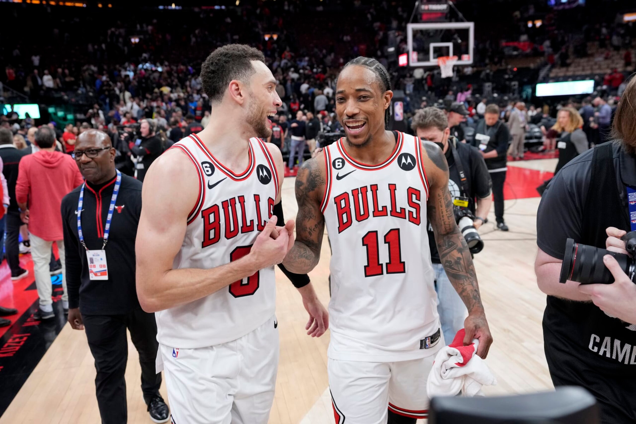TORONTO, CANADA - APRIL 12:  DeMar DeRozan #11 and Zach LaVine #8 of the Chicago Bulls smile after the game against the Toronto Raptors during the 2023 Play-In Tournament on April 12, 2023 at the Scotiabank Arena in Toronto, Ontario, Canada.  NOTE TO USER: User expressly acknowledges and agrees that, by downloading and or using this Photograph, user is consenting to the terms and conditions of the Getty Images License Agreement.  Mandatory Copyright Notice: Copyright 2022 NBAE (Photo by Mark Blinch/NBAE via Getty Images)
