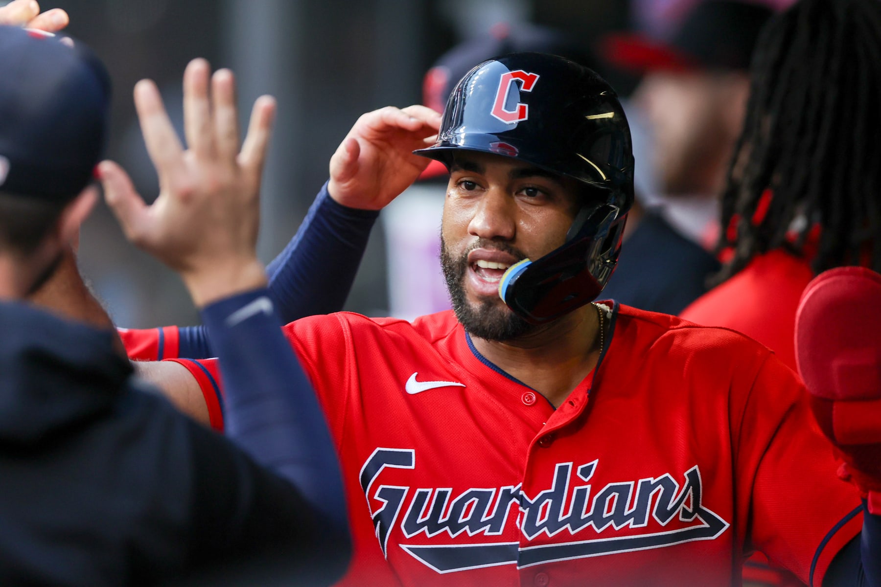 CLEVELAND, OH - JULY 25: Cleveland Guardians shortstop Amed Rosario (1) is congratulated in the dugout after scoring a run during the sixth inning of the Major League Baseball game between the Kansas City Royals and Cleveland Guardians on July 25, 2023, at Progressive Field in Cleveland, OH.  (Photo by Frank Jansky/Icon Sportswire via Getty Images)