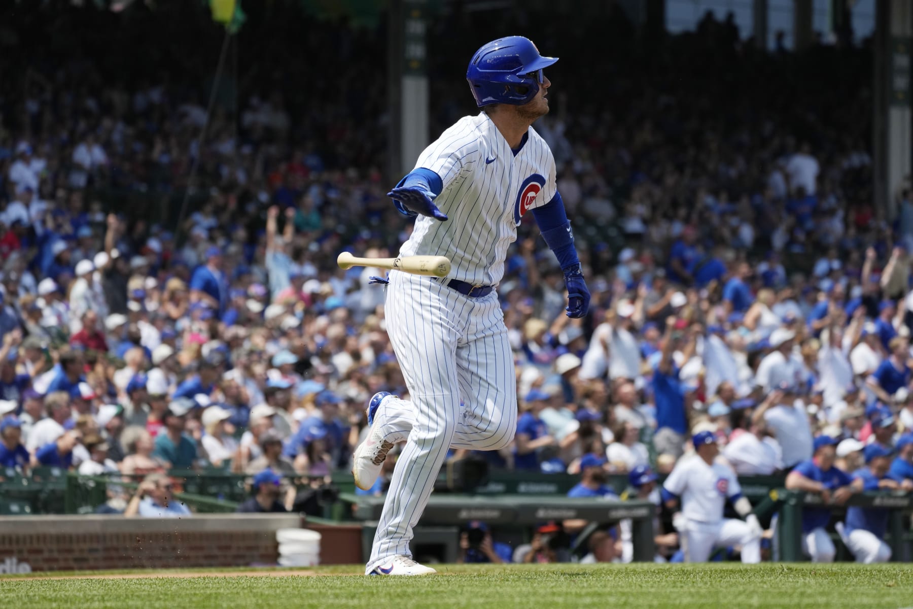 Chicago Cubs' Cody Bellinger rounds the bases as he watches his two-run home run during the first inning of a baseball game against the St. Louis Cardinals, Sunday, July 23, 2023, in Chicago. (AP Photo/Nam Y. Huh)